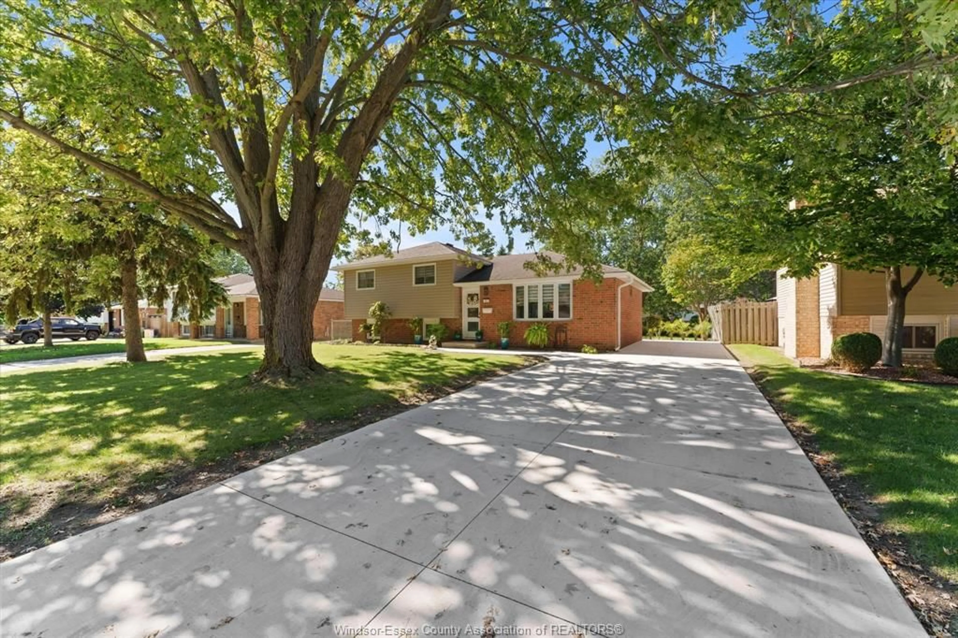 Home with brick exterior material, street for 127 BOARDWALK Ave, Amherstburg Ontario N9V 3C7