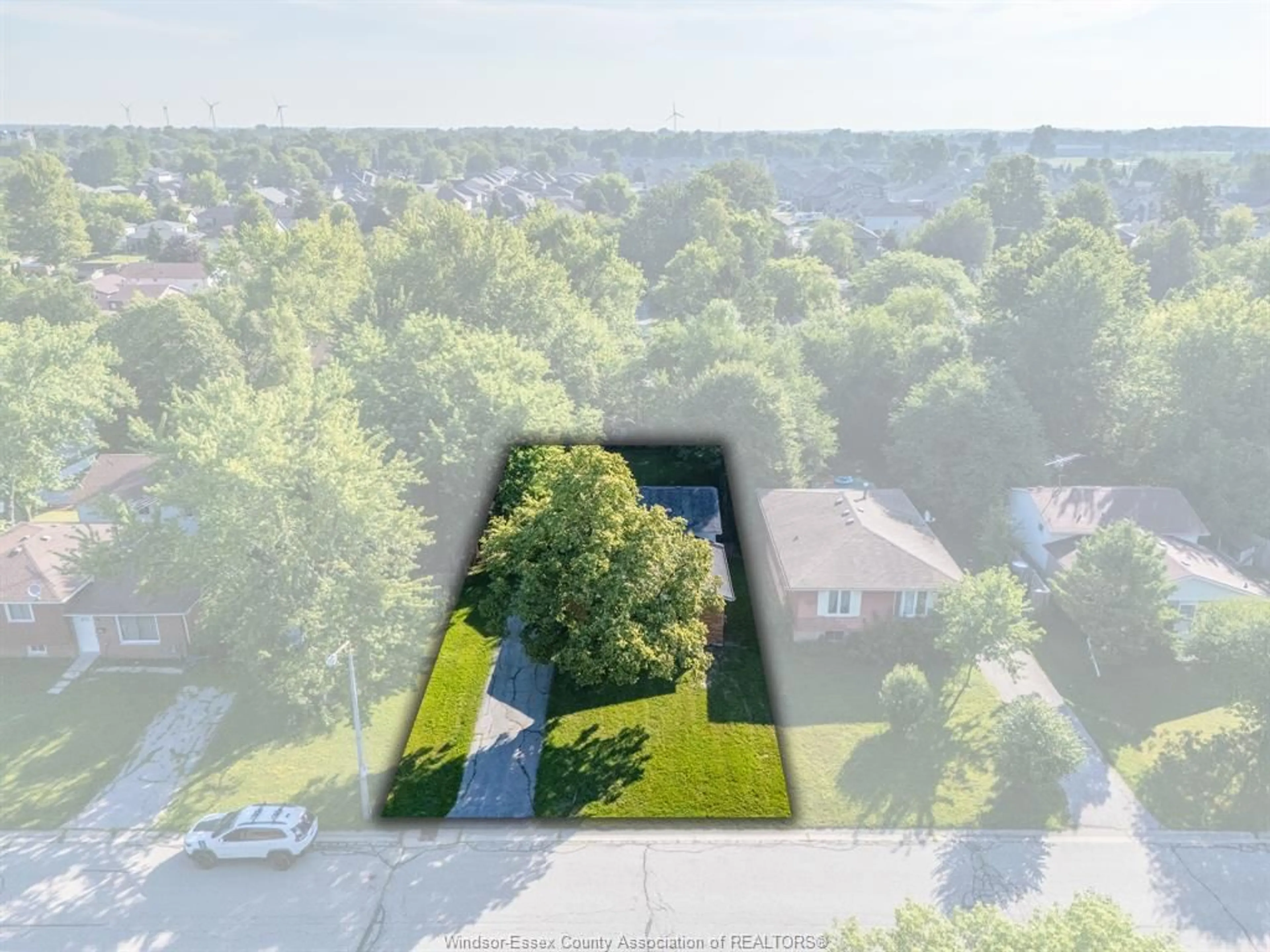 A pic from outside/outdoor area/front of a property/back of a property/a pic from drone, unknown for 105 KIM Crt, Essex Ontario N8M 2Z8