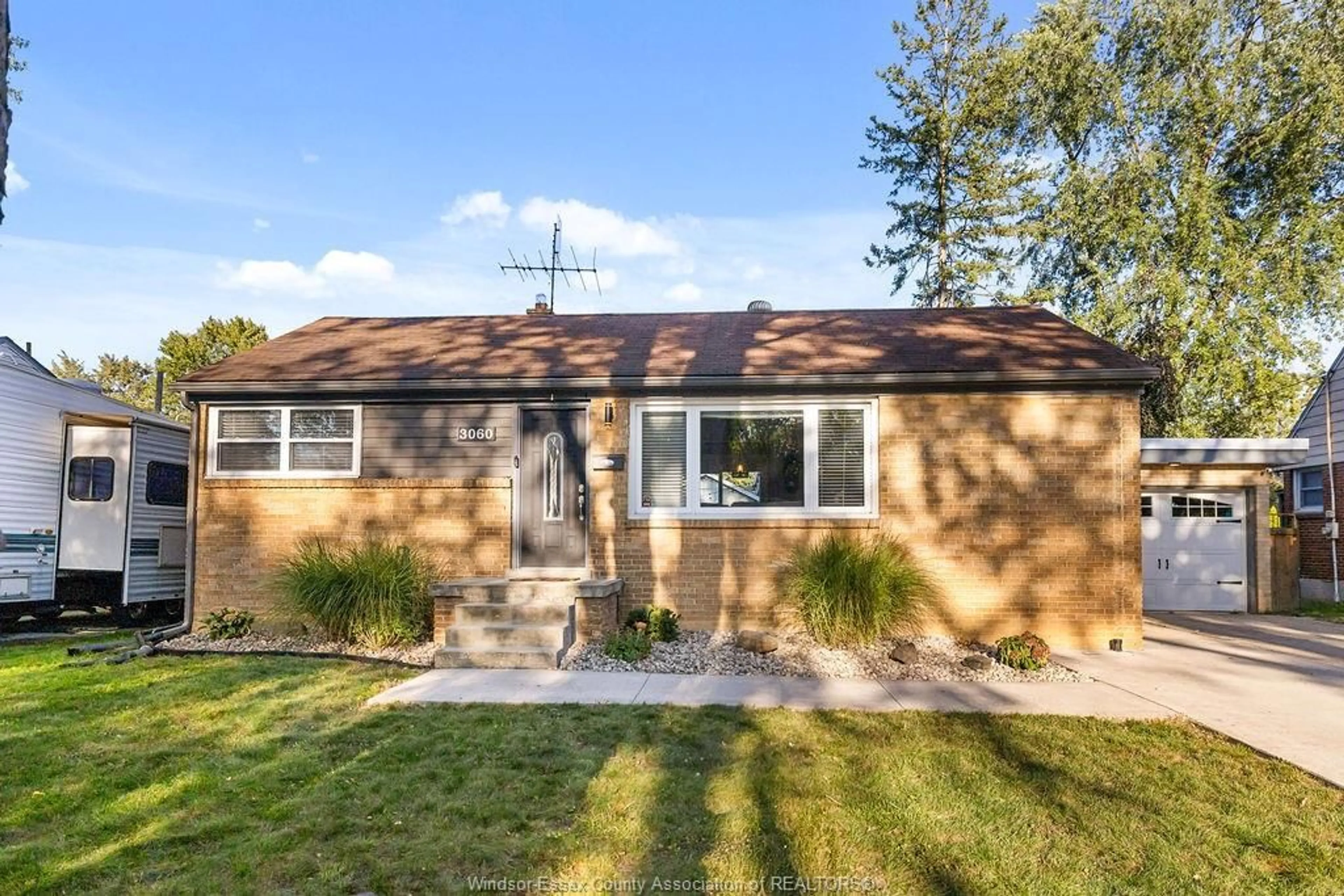 Home with brick exterior material, street for 3060 DANDURAND Ave, Windsor Ontario N9E 2E6