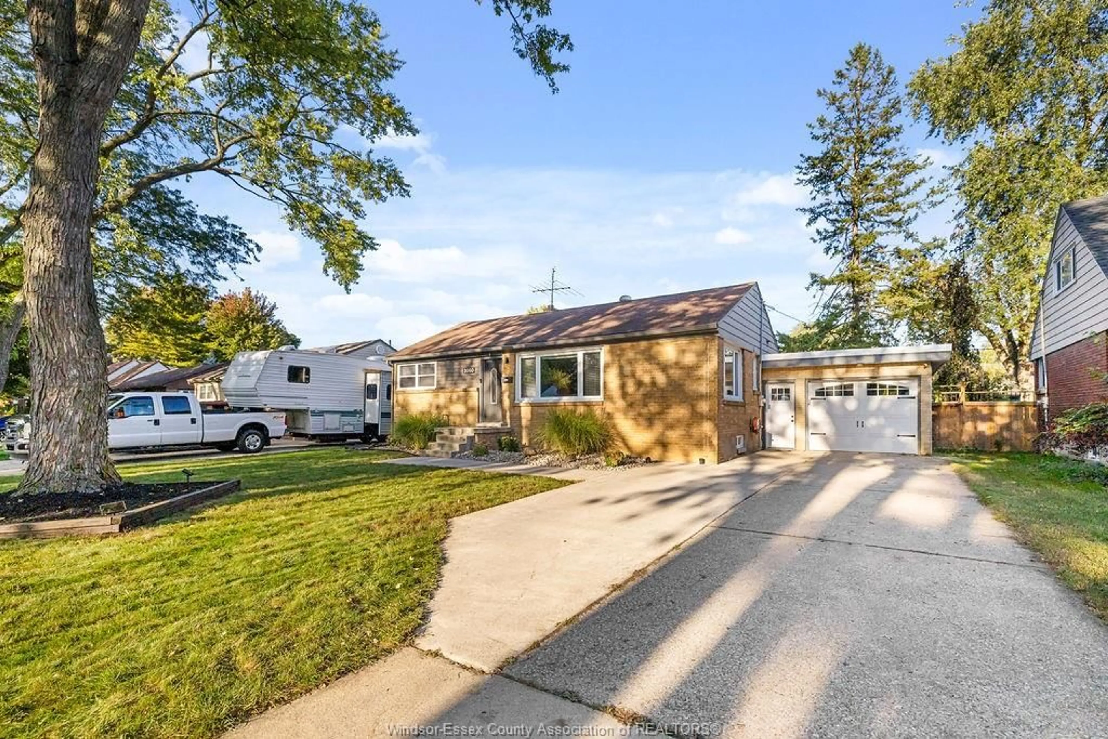 Home with vinyl exterior material, street for 3060 DANDURAND Ave, Windsor Ontario N9E 2E6