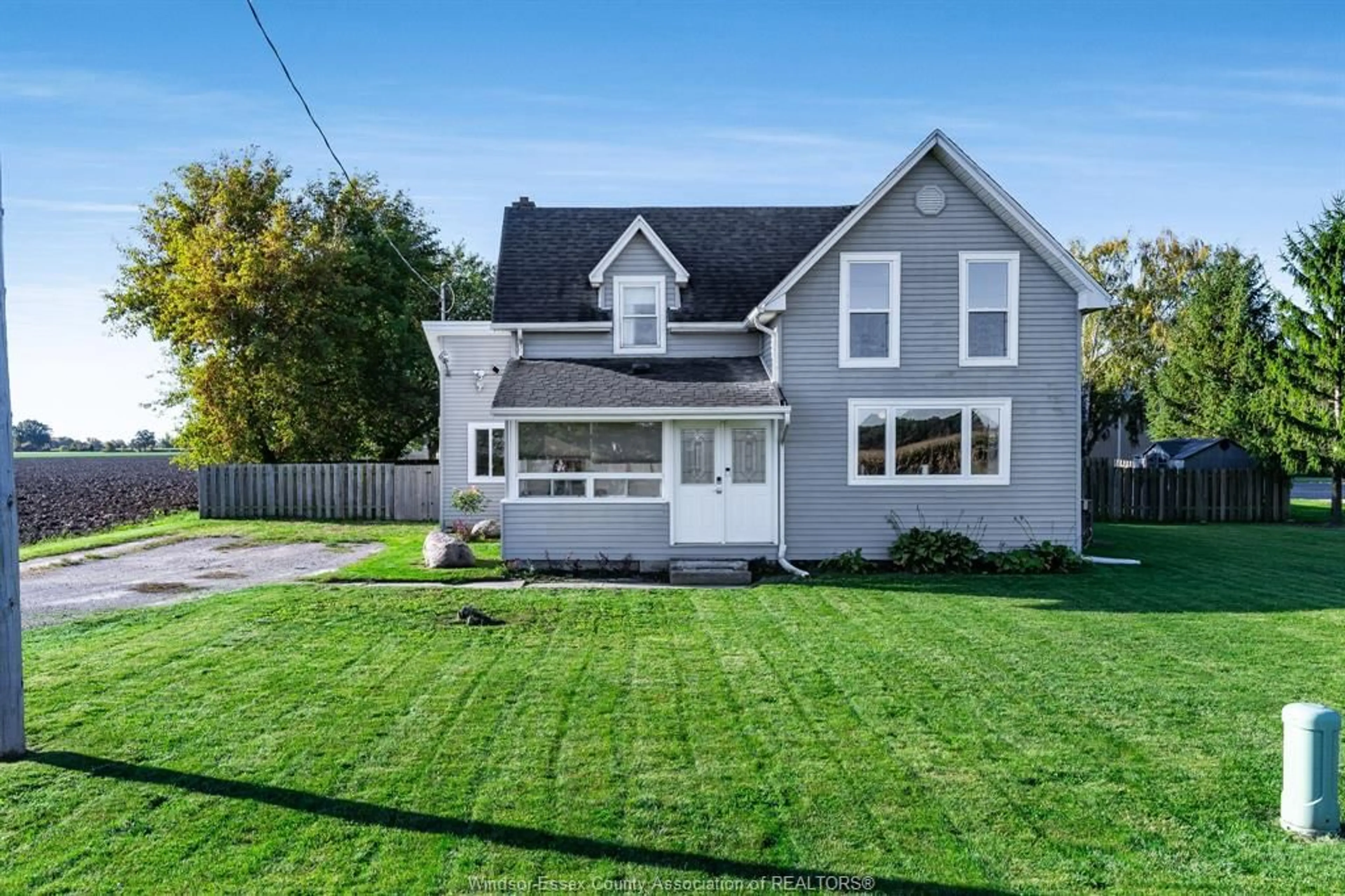 Home with vinyl exterior material, street for 691 Road 4, Kingsville Ontario N9Y 2E5
