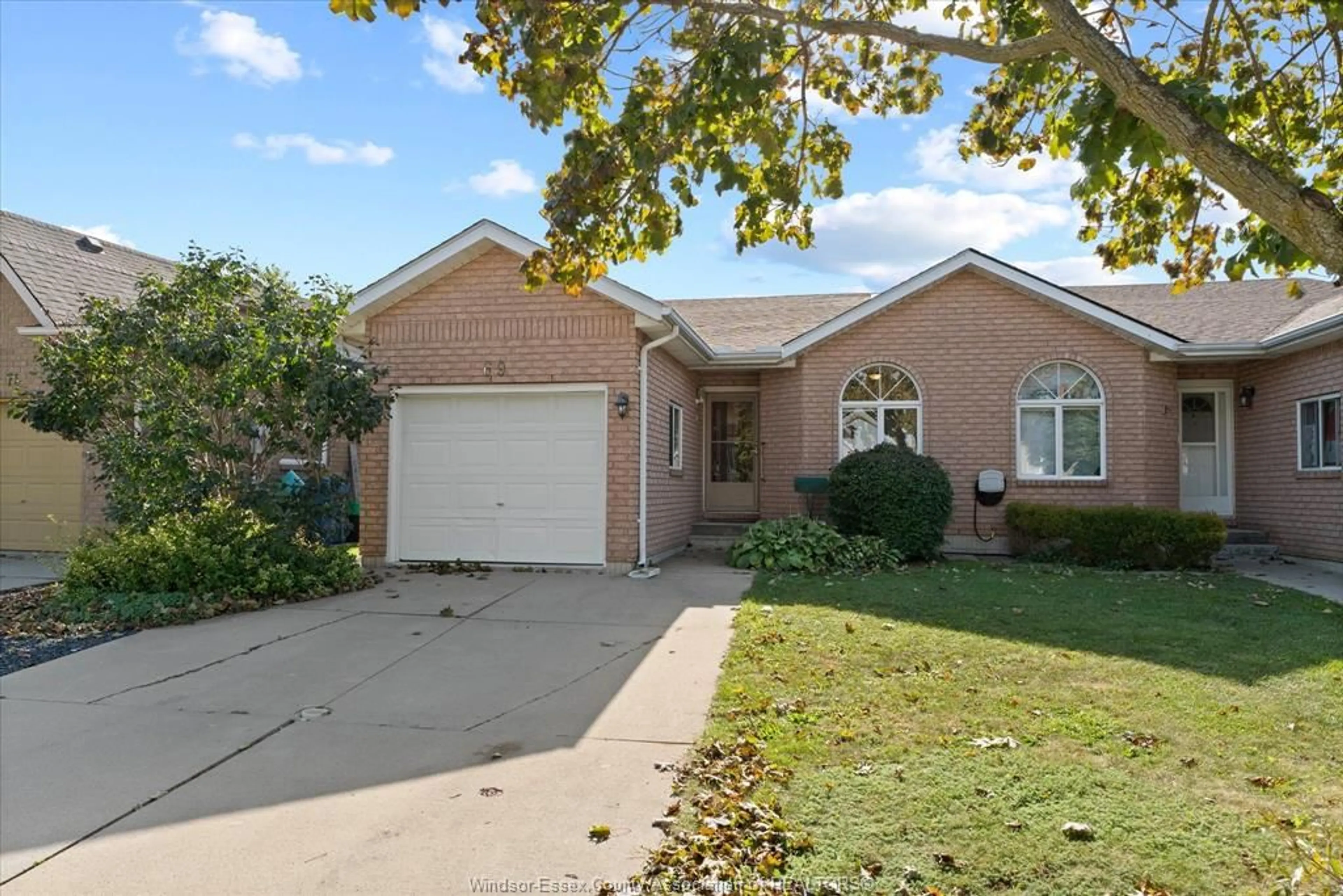 Home with brick exterior material, street for 69 Rudgate Lane, Leamington Ontario N8H 5K7