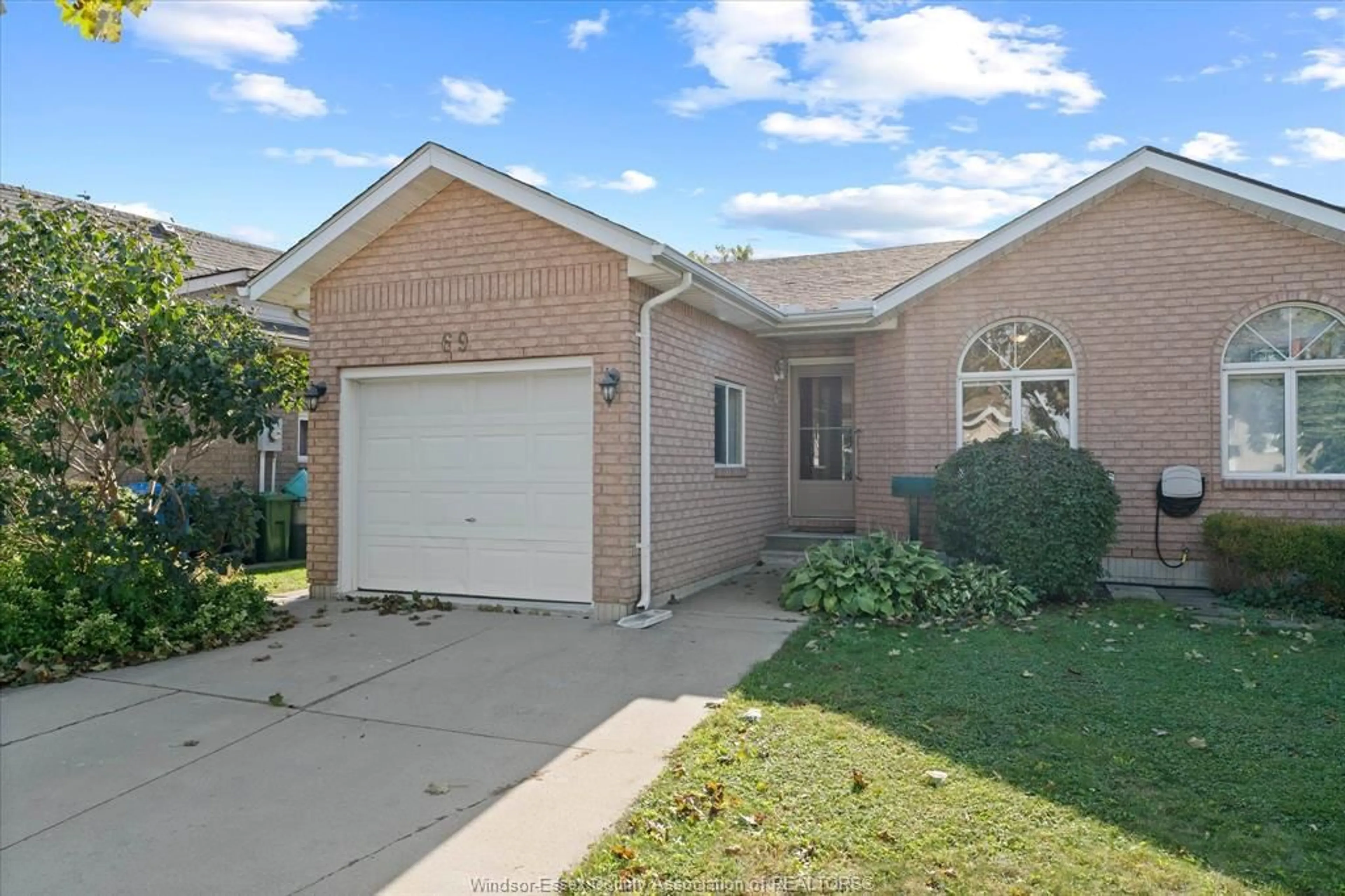 Home with brick exterior material, street for 69 Rudgate Lane, Leamington Ontario N8H 5K7
