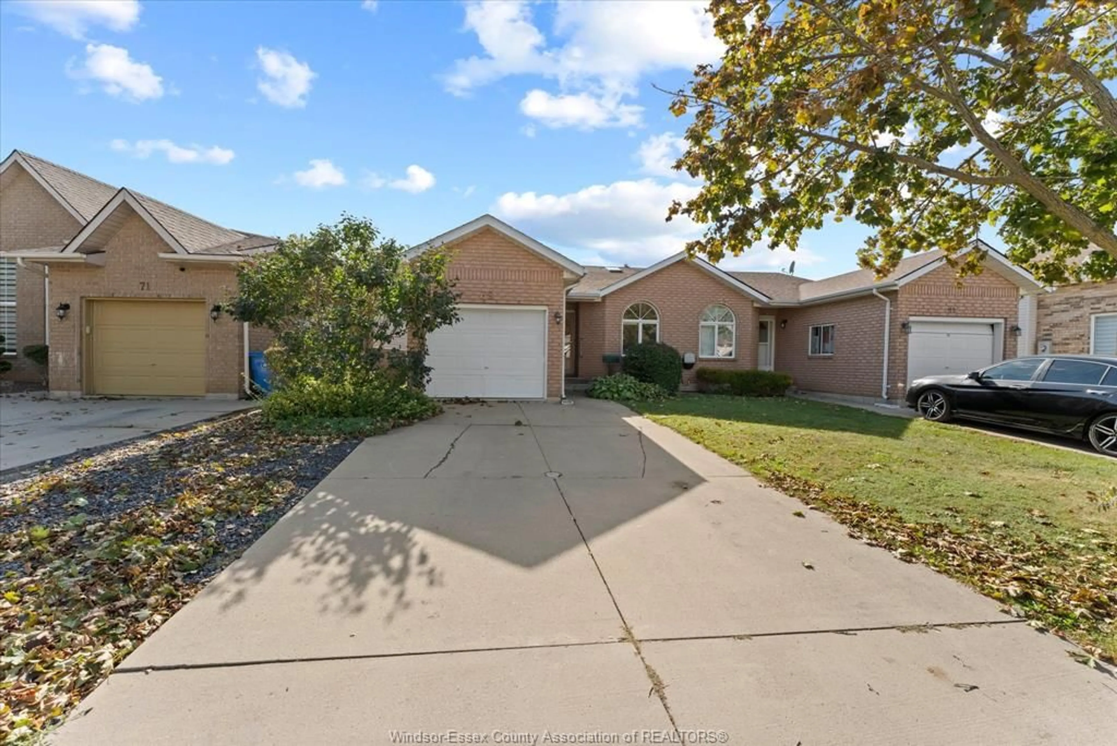 A pic from outside/outdoor area/front of a property/back of a property/a pic from drone, street for 69 Rudgate Lane, Leamington Ontario N8H 5K7