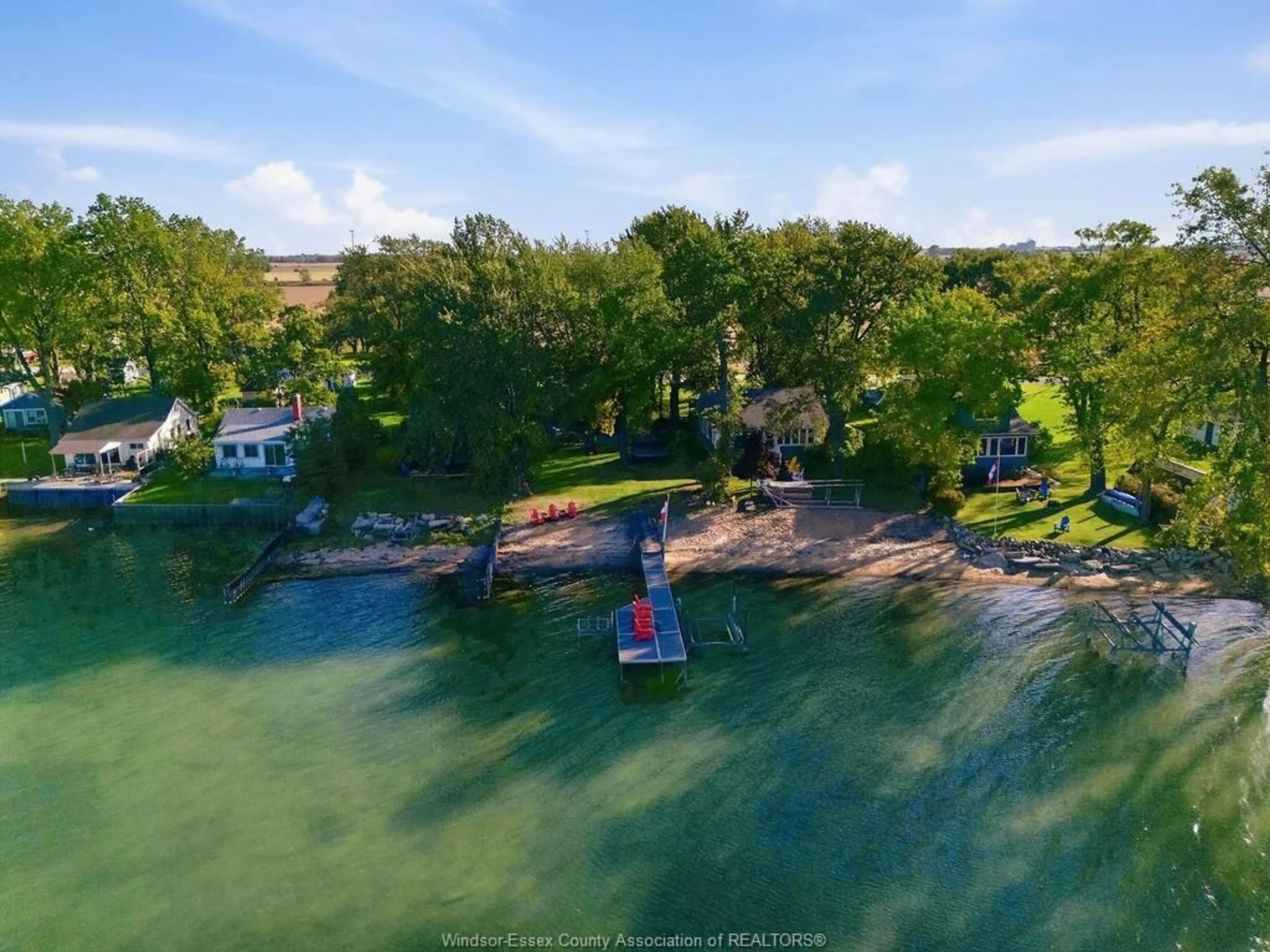 A pic from outside/outdoor area/front of a property/back of a property/a pic from drone, water/lake/river/ocean view for 9952 ST CLAIR RD, Lakeshore Ontario N0R 1N0