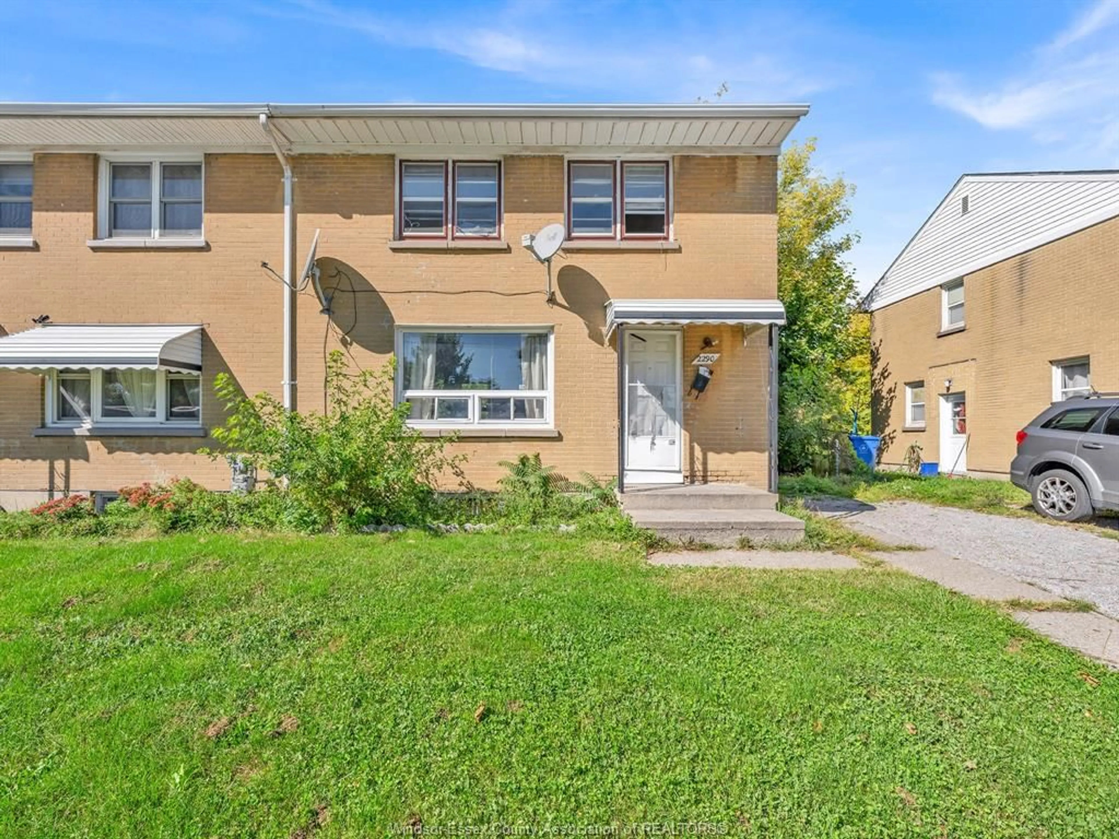 A pic from outside/outdoor area/front of a property/back of a property/a pic from drone, street for 2290 TECUMSEH Rd, Windsor Ontario N9B 1W1