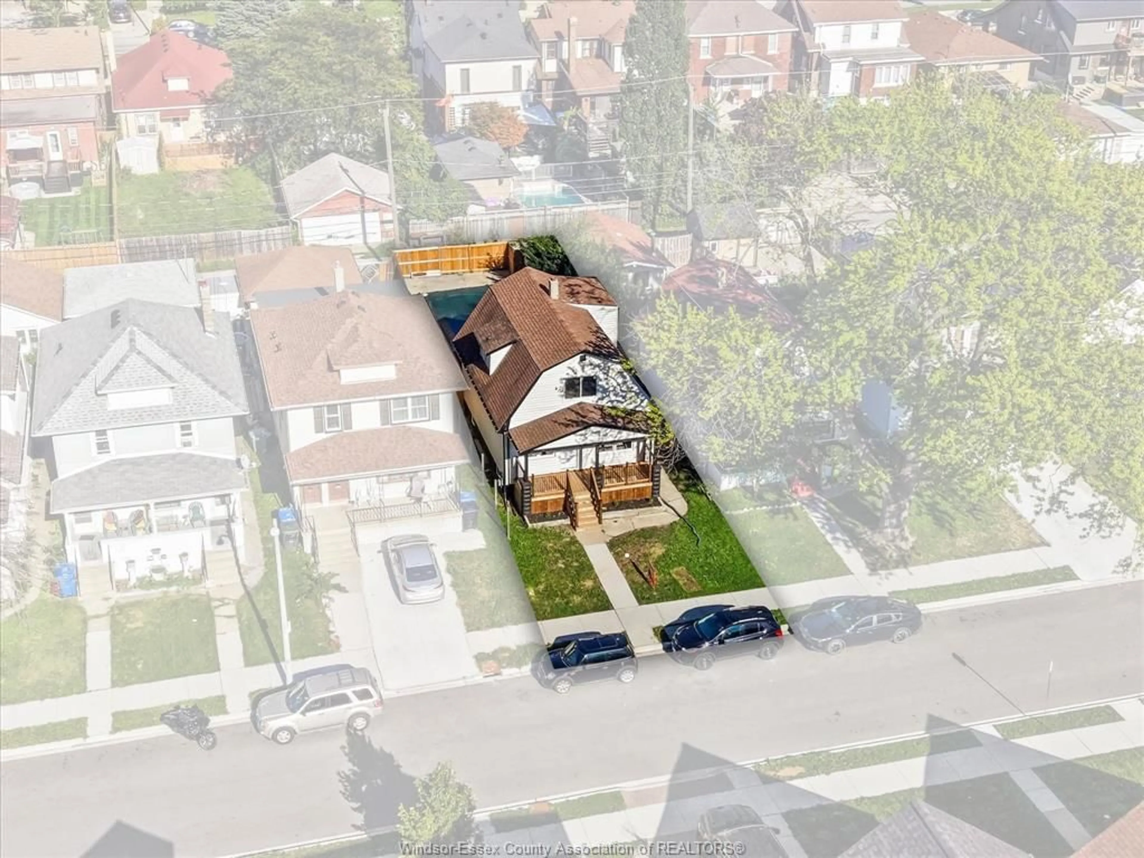A pic from outside/outdoor area/front of a property/back of a property/a pic from drone, street for 930 Elsmere, Windsor Ontario N9A 2A9