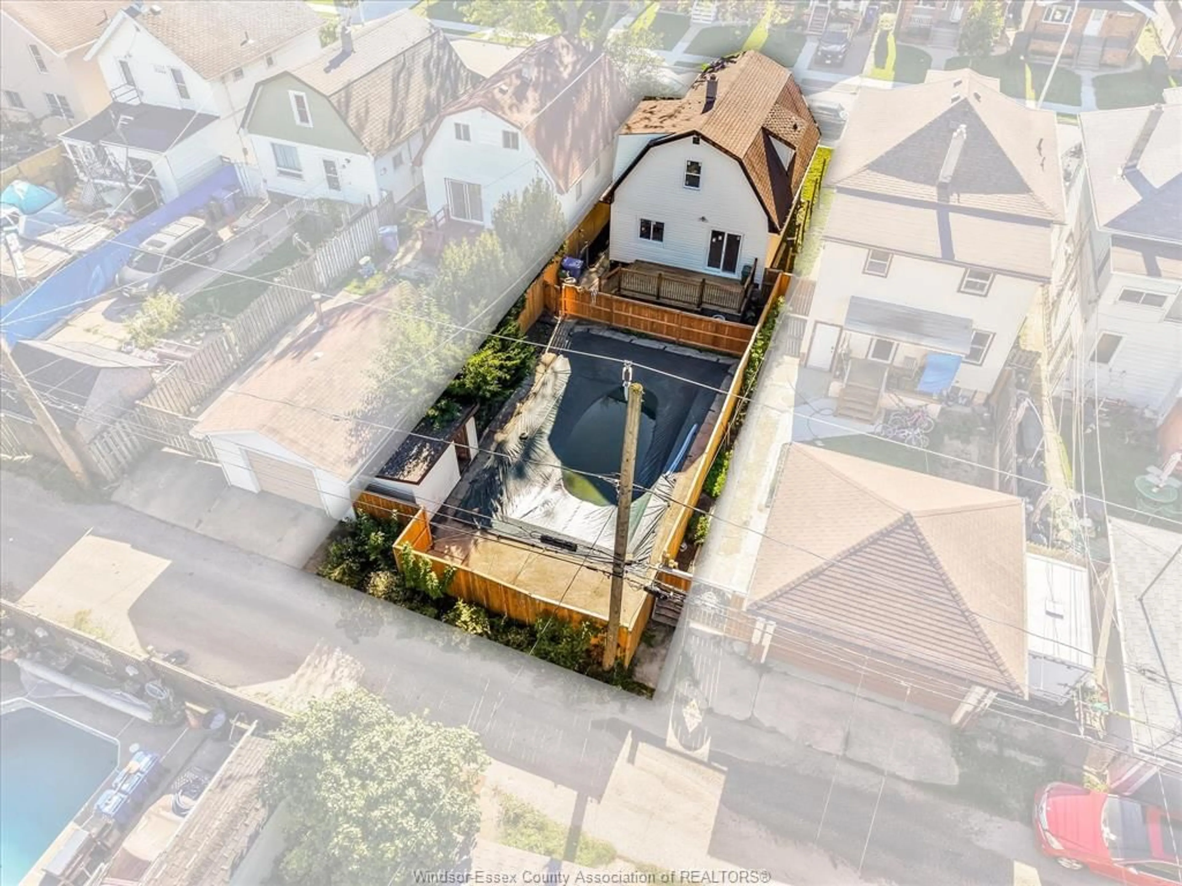 A pic from outside/outdoor area/front of a property/back of a property/a pic from drone, street for 930 Elsmere, Windsor Ontario N9A 2A9