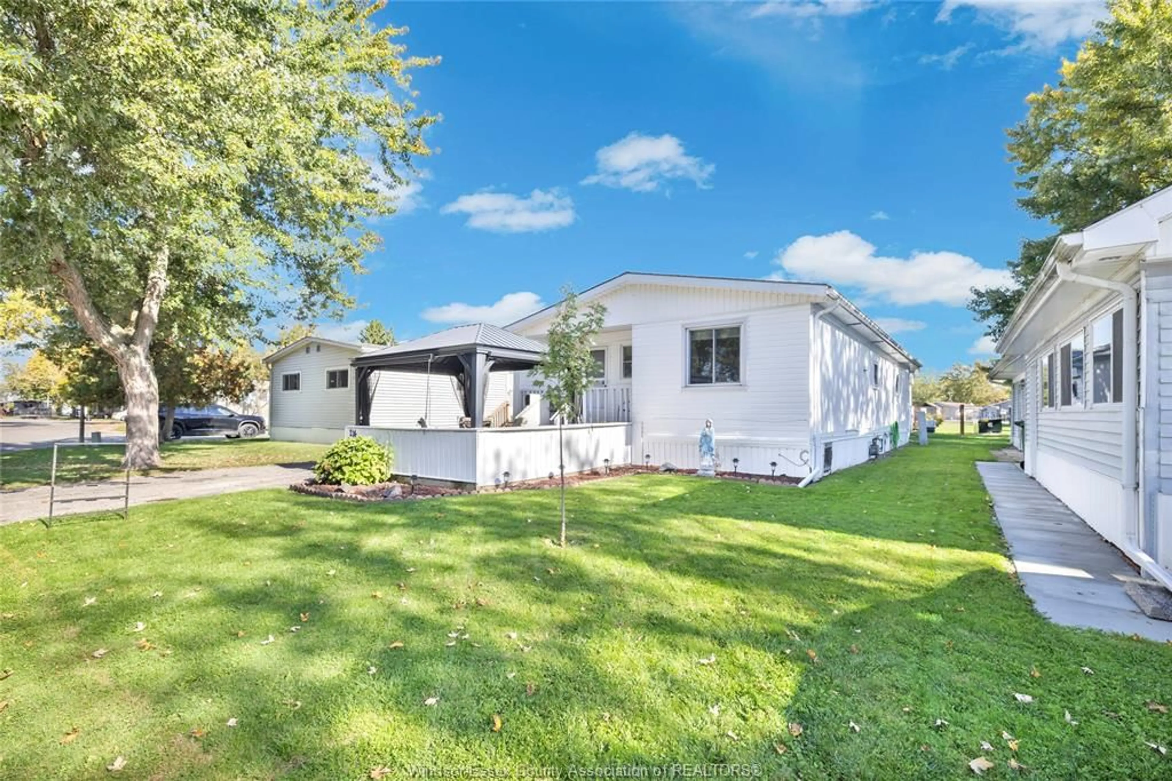 A pic from outside/outdoor area/front of a property/back of a property/a pic from drone, water/lake/river/ocean view for 214 DANA Dr, Essex Ontario N8M 2A1