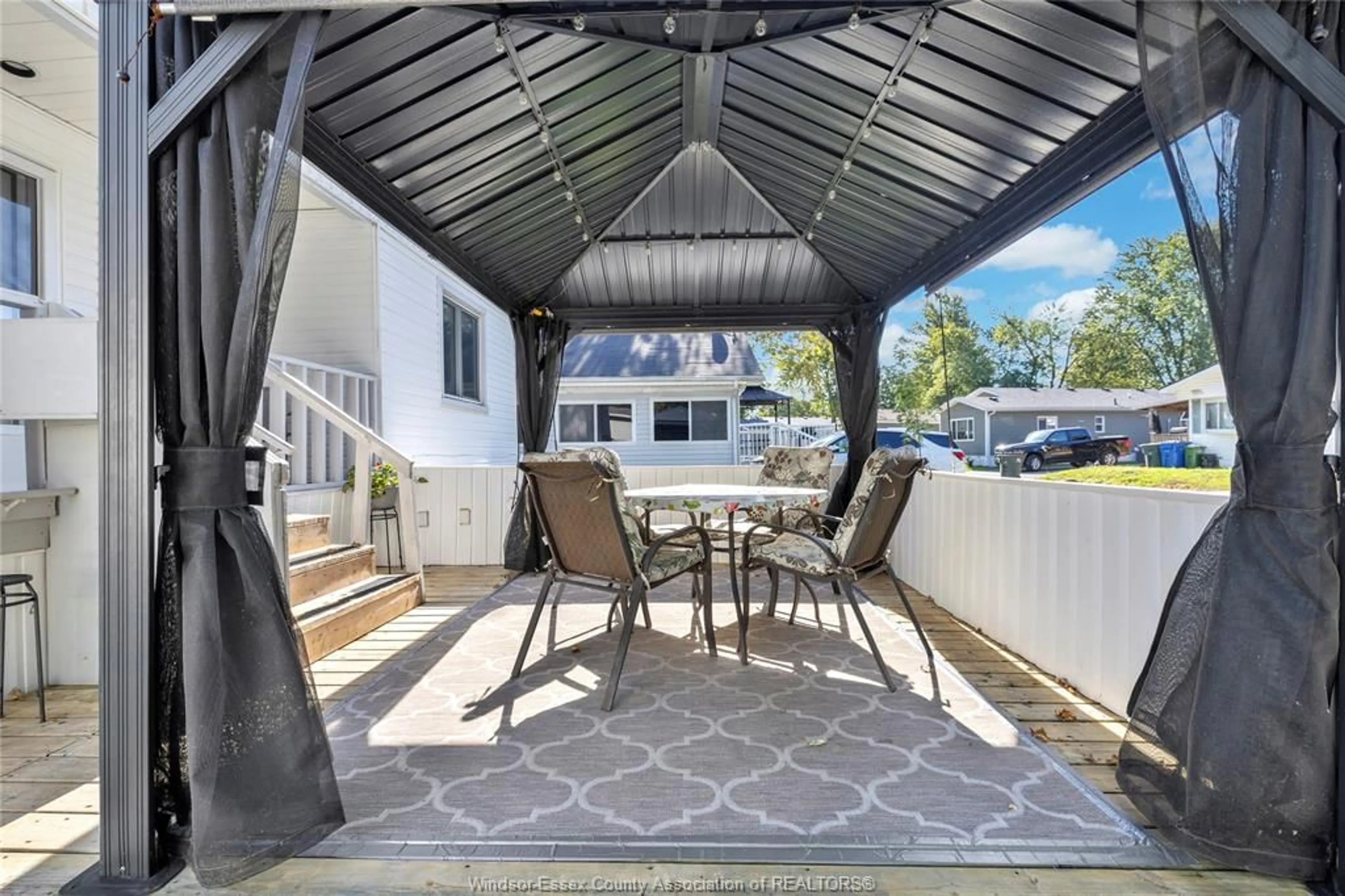 Patio, street for 214 DANA Dr, Essex Ontario N8M 2A1