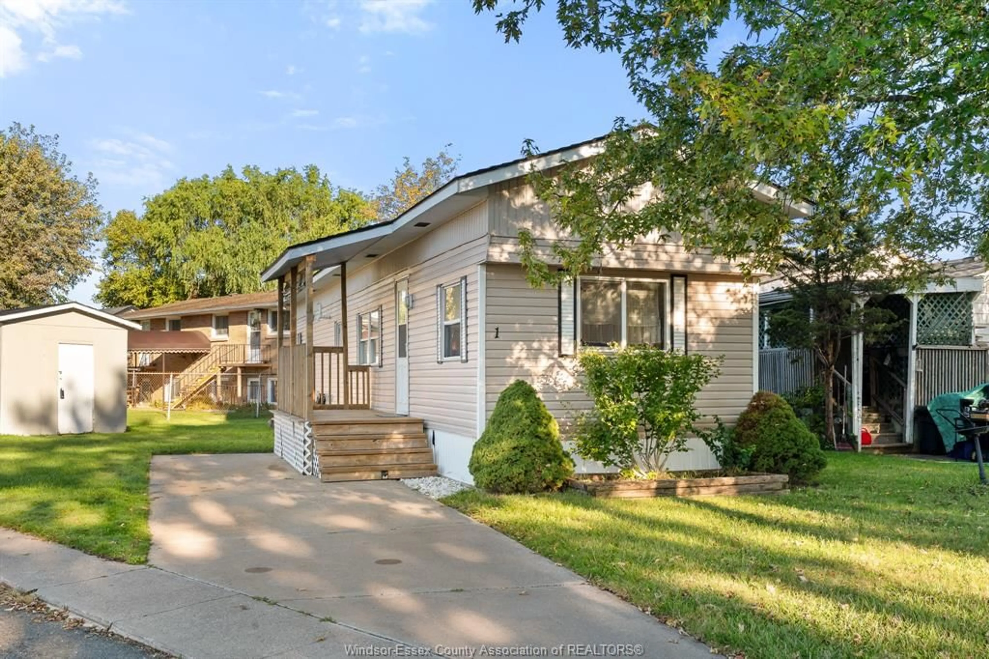 Home with vinyl exterior material, street for 1 Cedar Cres #101, McGregor Ontario N0R 1J0