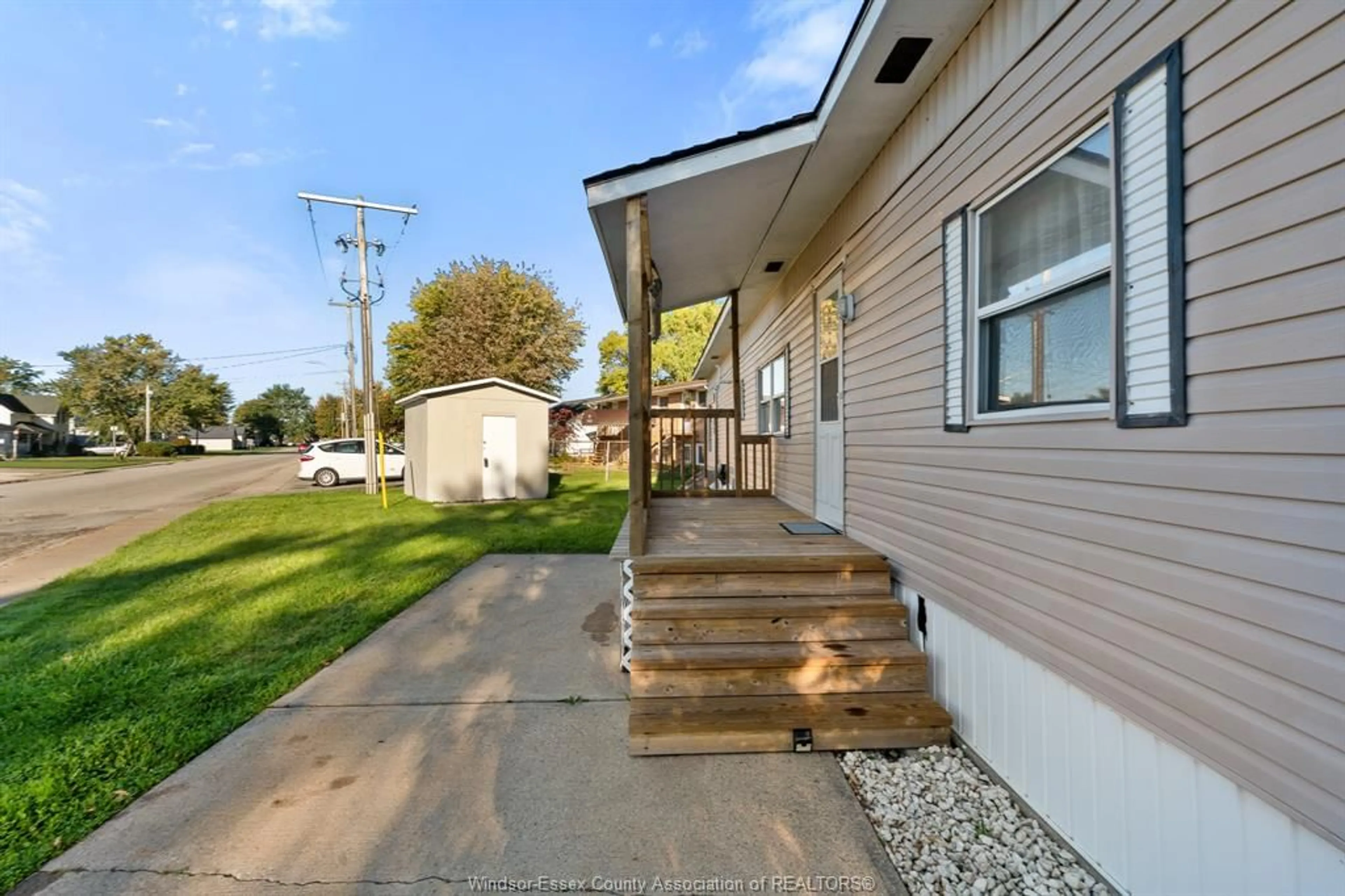 Home with vinyl exterior material, street for 1 Cedar Cres #101, McGregor Ontario N0R 1J0