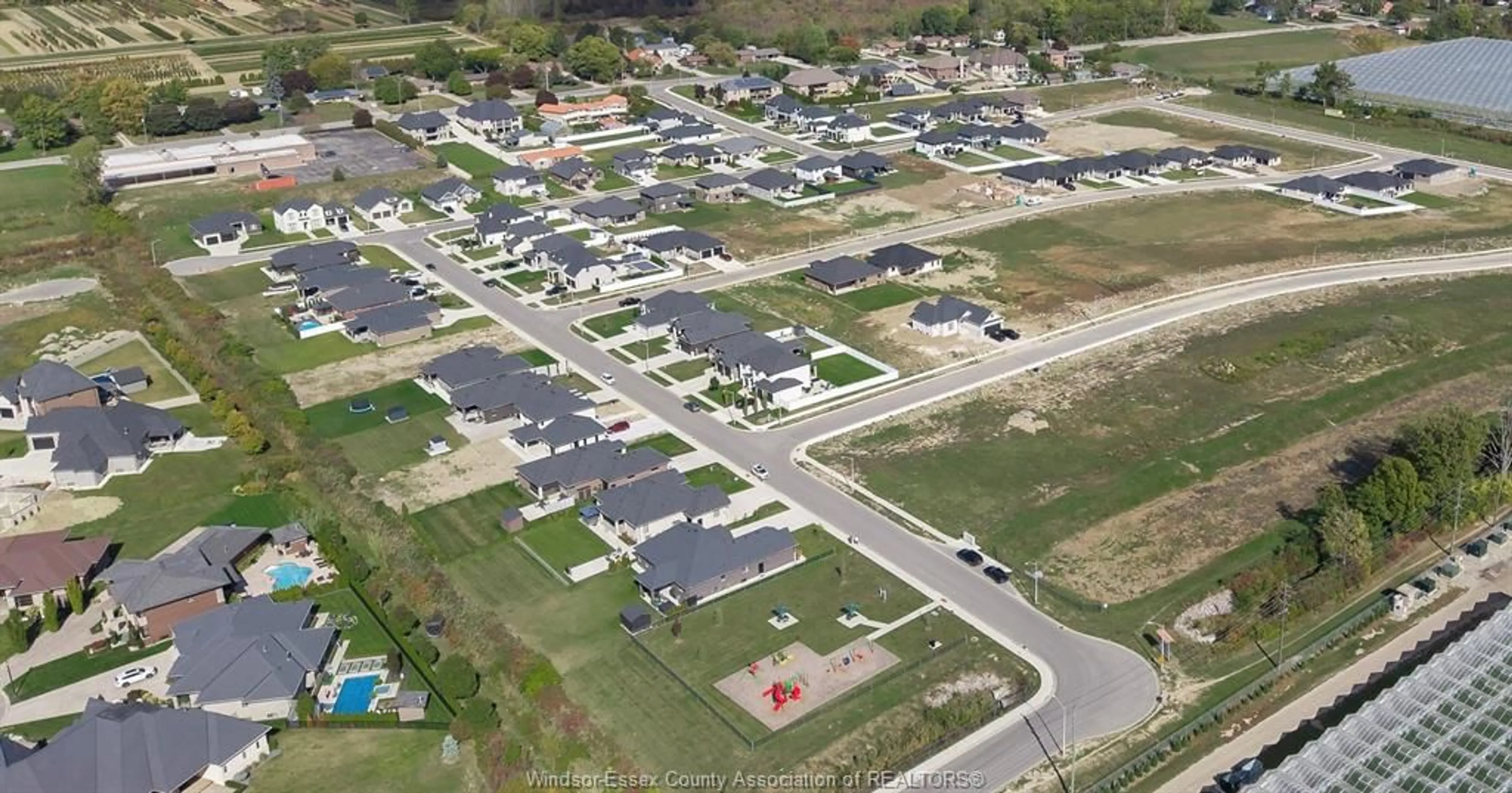 A pic from outside/outdoor area/front of a property/back of a property/a pic from drone, street for 1872 MOLISE Blvd, Kingsville Ontario N9Y 0G6