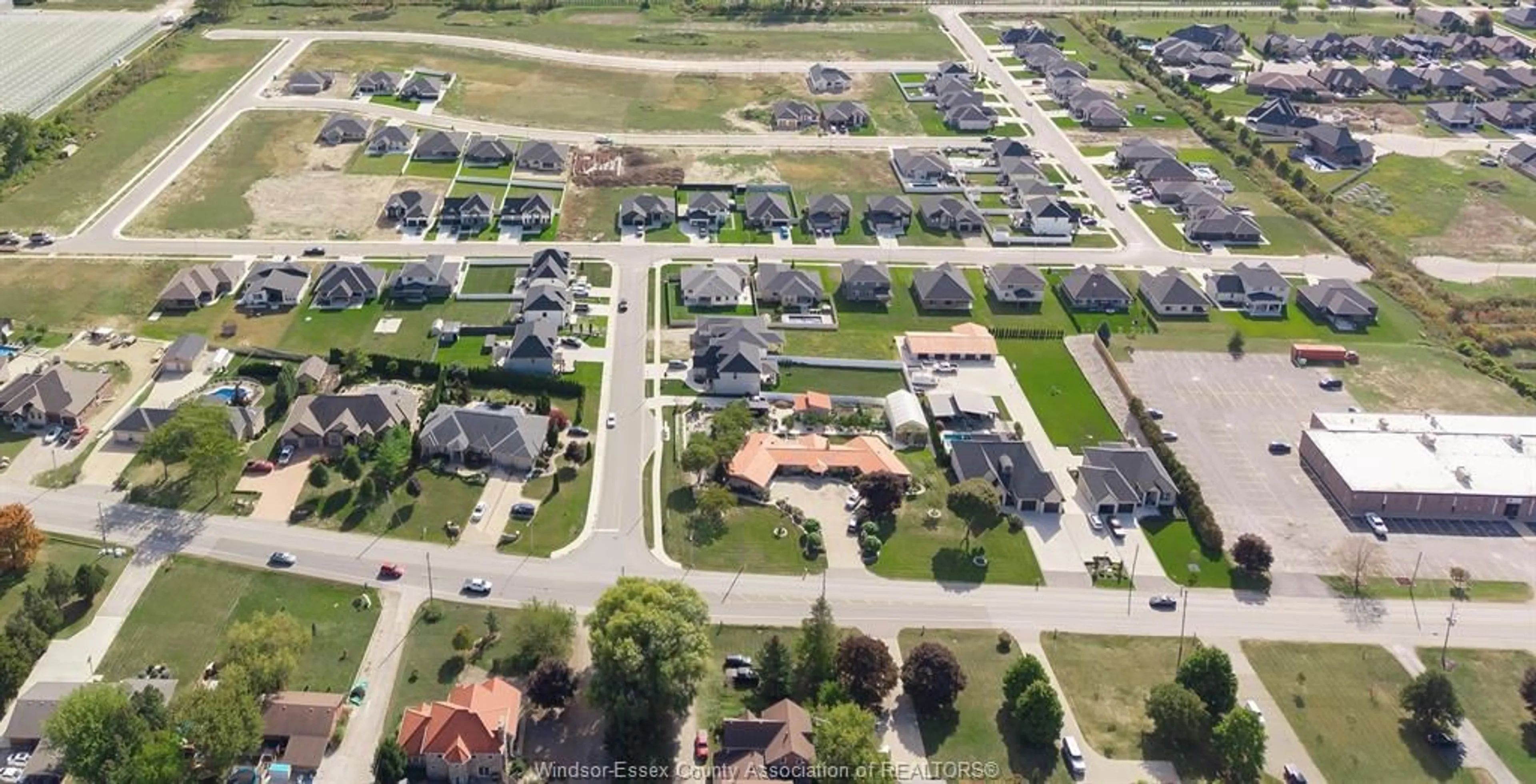 A pic from outside/outdoor area/front of a property/back of a property/a pic from drone, street for 1868 MOLISE Blvd, Kingsville Ontario N9Y 0G6