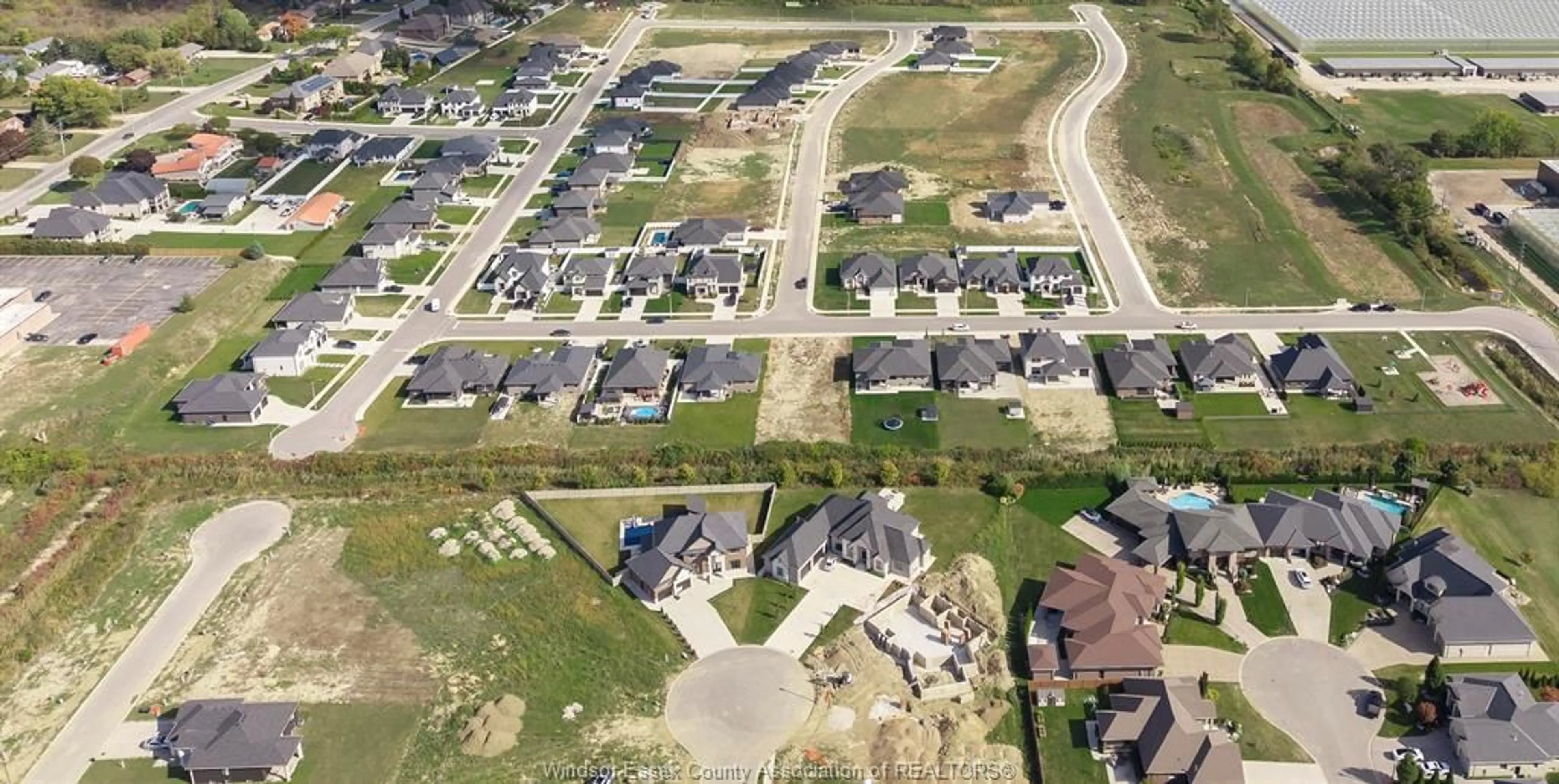 A pic from outside/outdoor area/front of a property/back of a property/a pic from drone, street for 1868 MOLISE Blvd, Kingsville Ontario N9Y 0G6