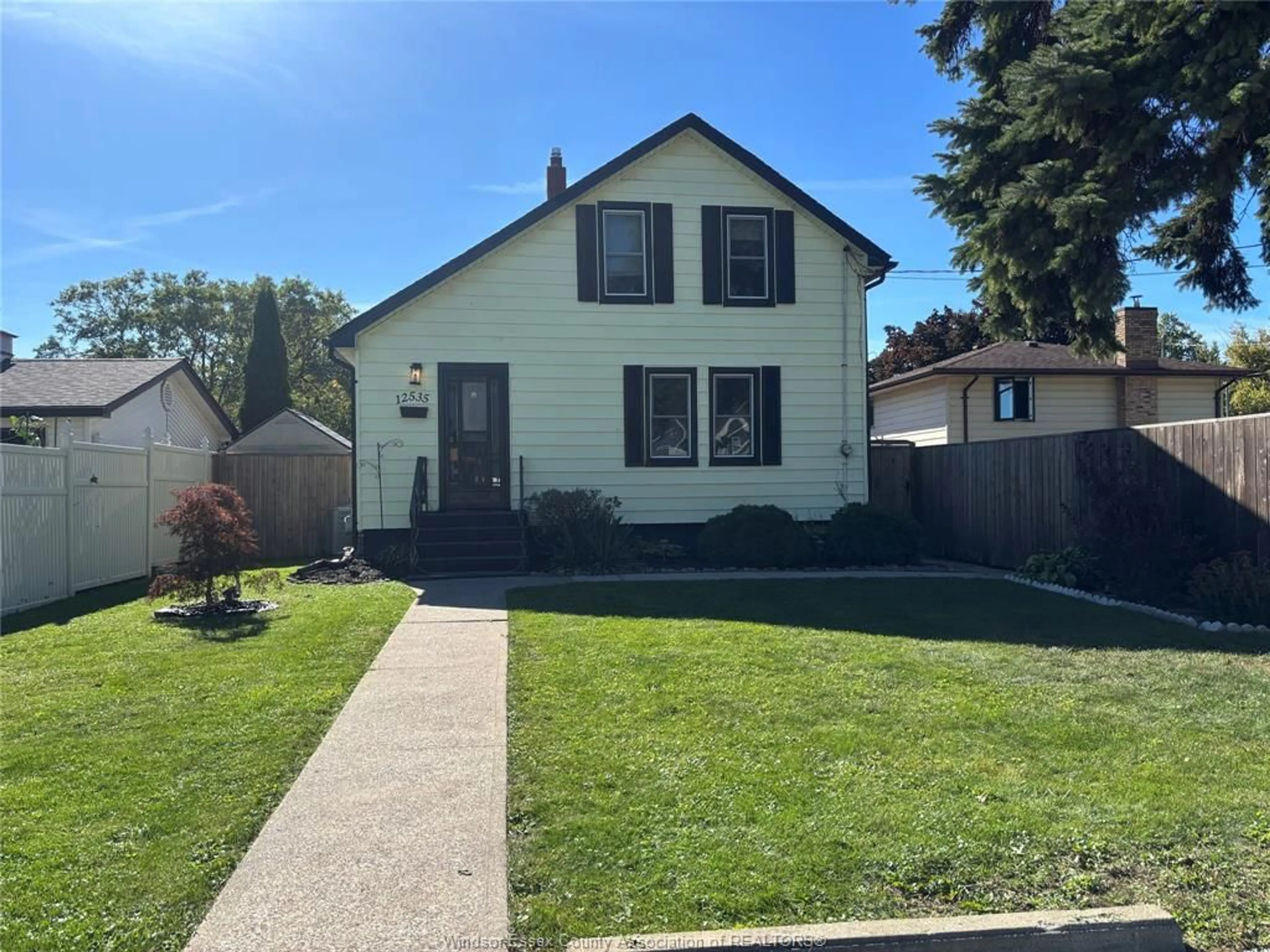 Home with vinyl exterior material, street for 12535 BALLARD St, Tecumseh Ontario N8W 1J4