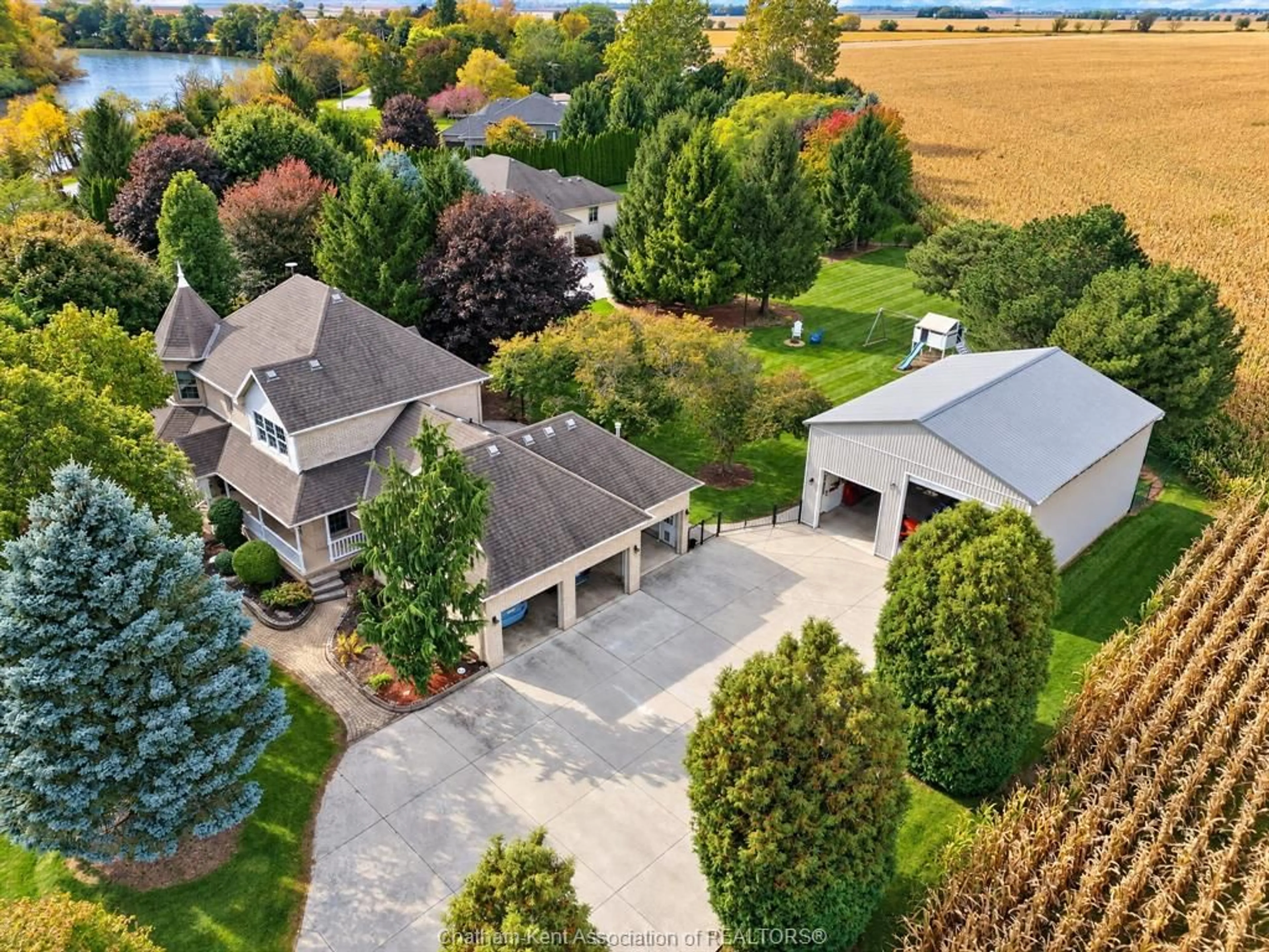 A pic from outside/outdoor area/front of a property/back of a property/a pic from drone, water/lake/river/ocean view for 7681 Grande River Line, Chatham-Kent Ontario N7M 5J7