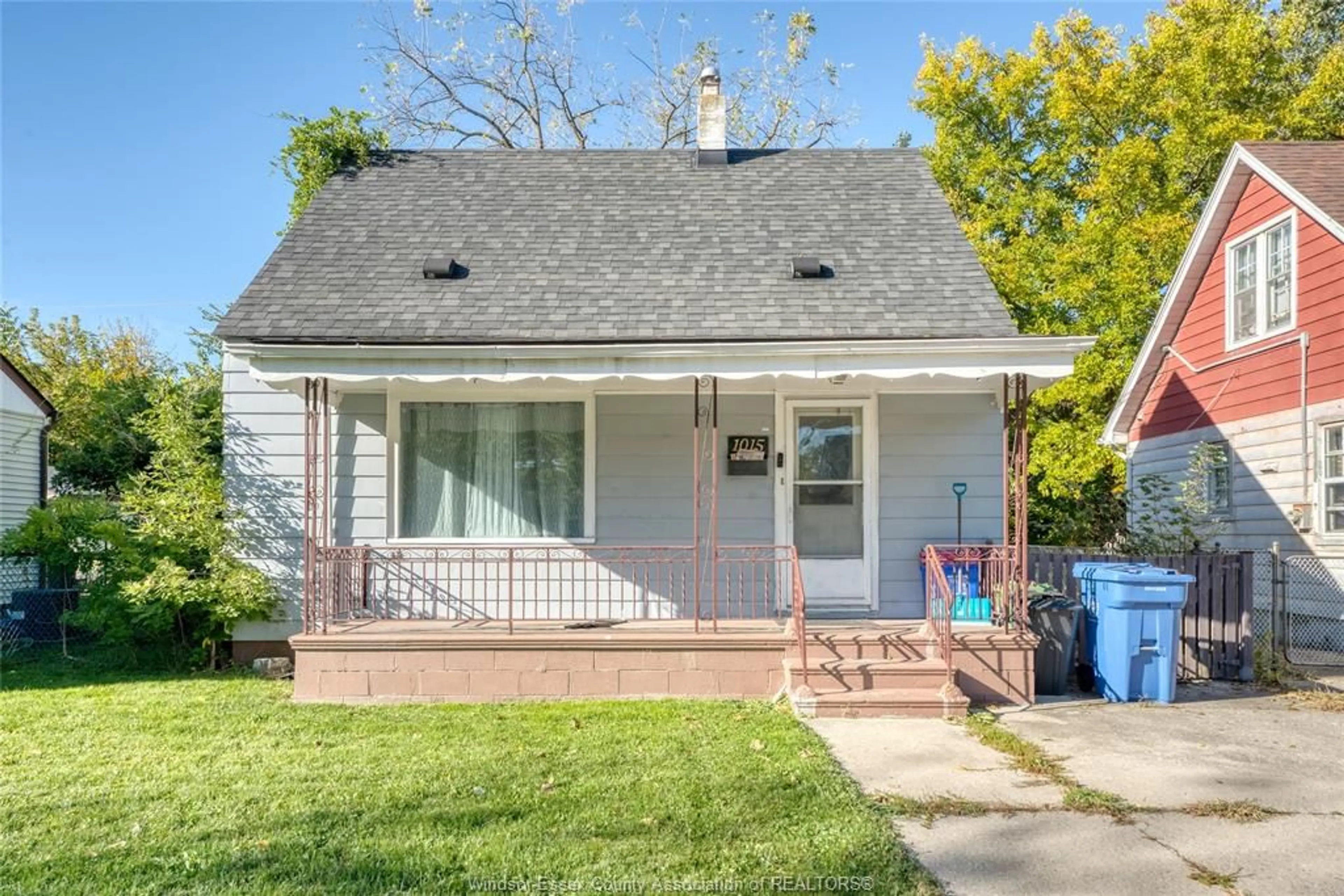 Home with vinyl exterior material, street for 1015 PARTINGTON Ave, Windsor Ontario N9B 2P1