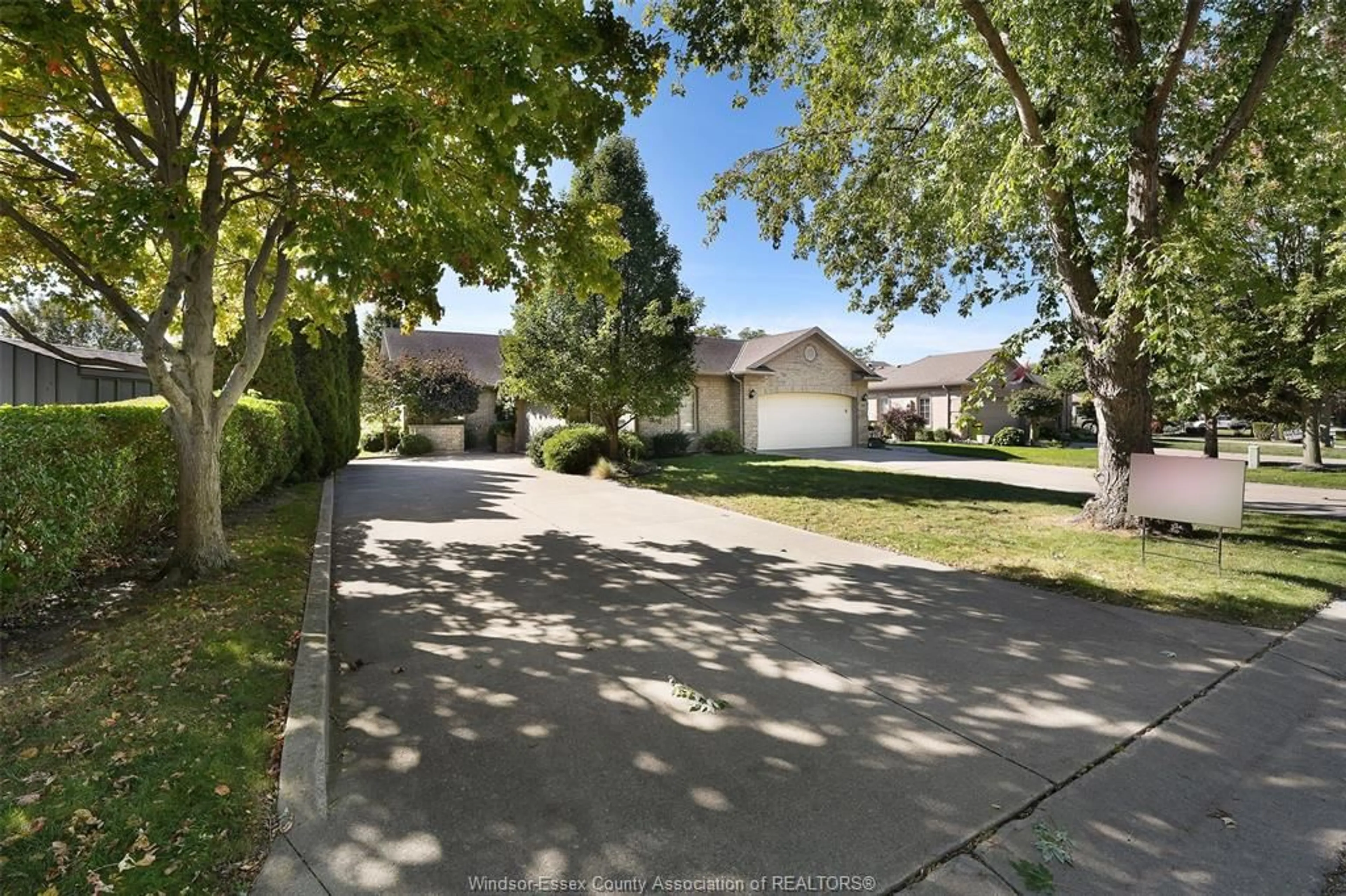 A pic from outside/outdoor area/front of a property/back of a property/a pic from drone, street for 46 CHEROKEE Lane, Leamington Ontario N8H 5H8