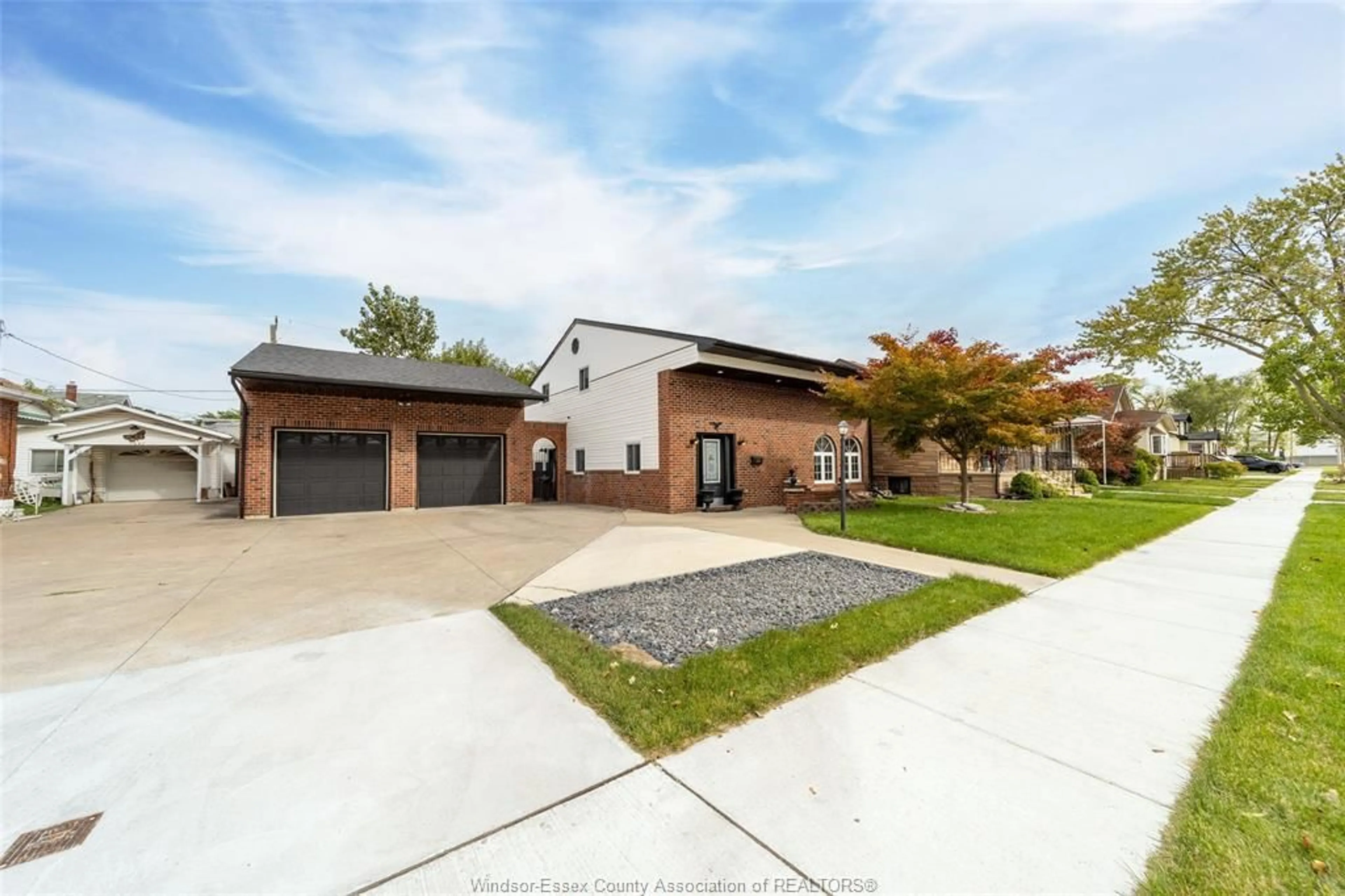 Home with brick exterior material, street for 1850 ST LUKE Rd, Windsor Ontario N8W 3W7