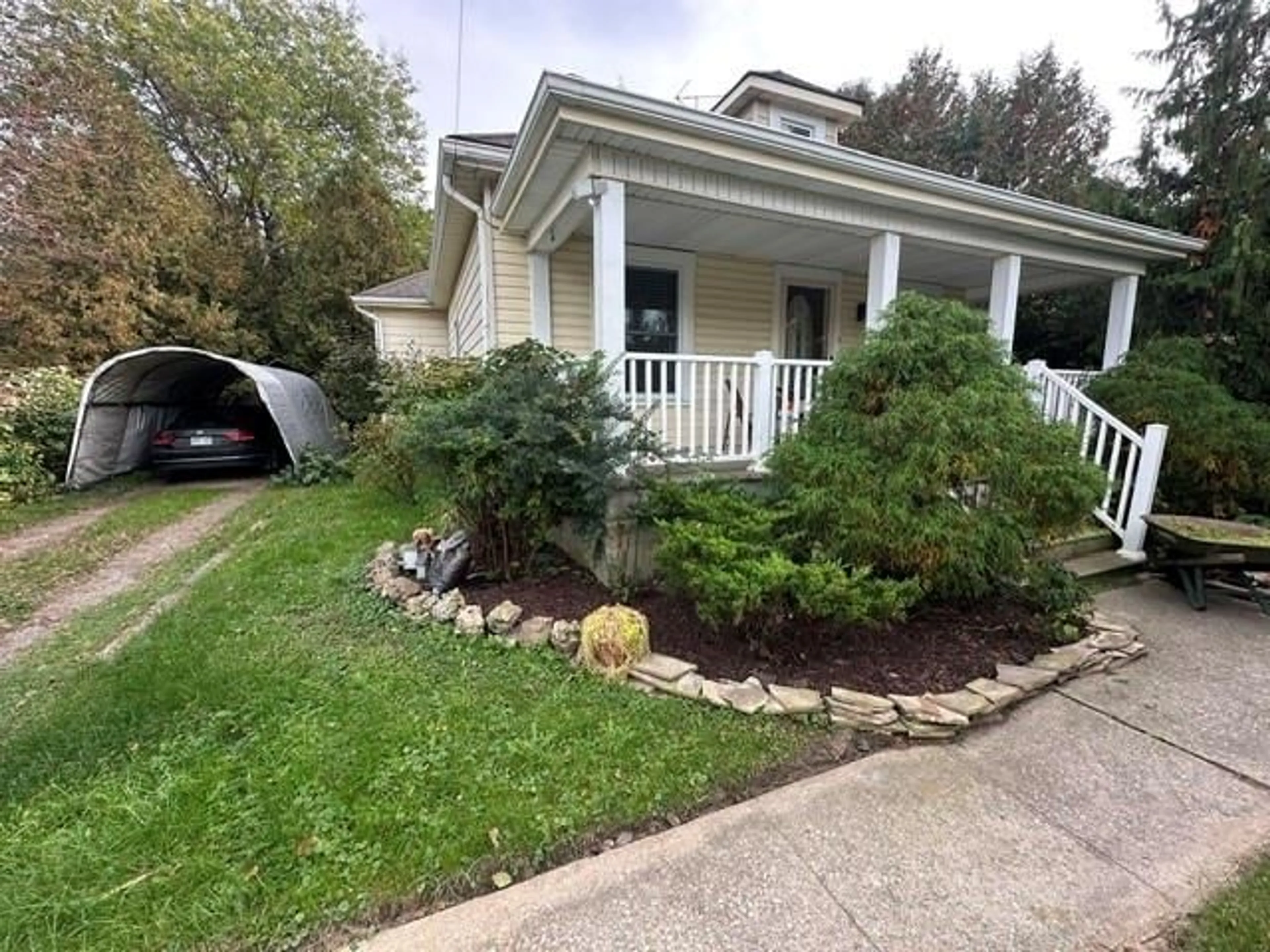 Home with vinyl exterior material, street for 11630 LONGWOODS Rd, Kent Bridge Ontario N0P 1V0
