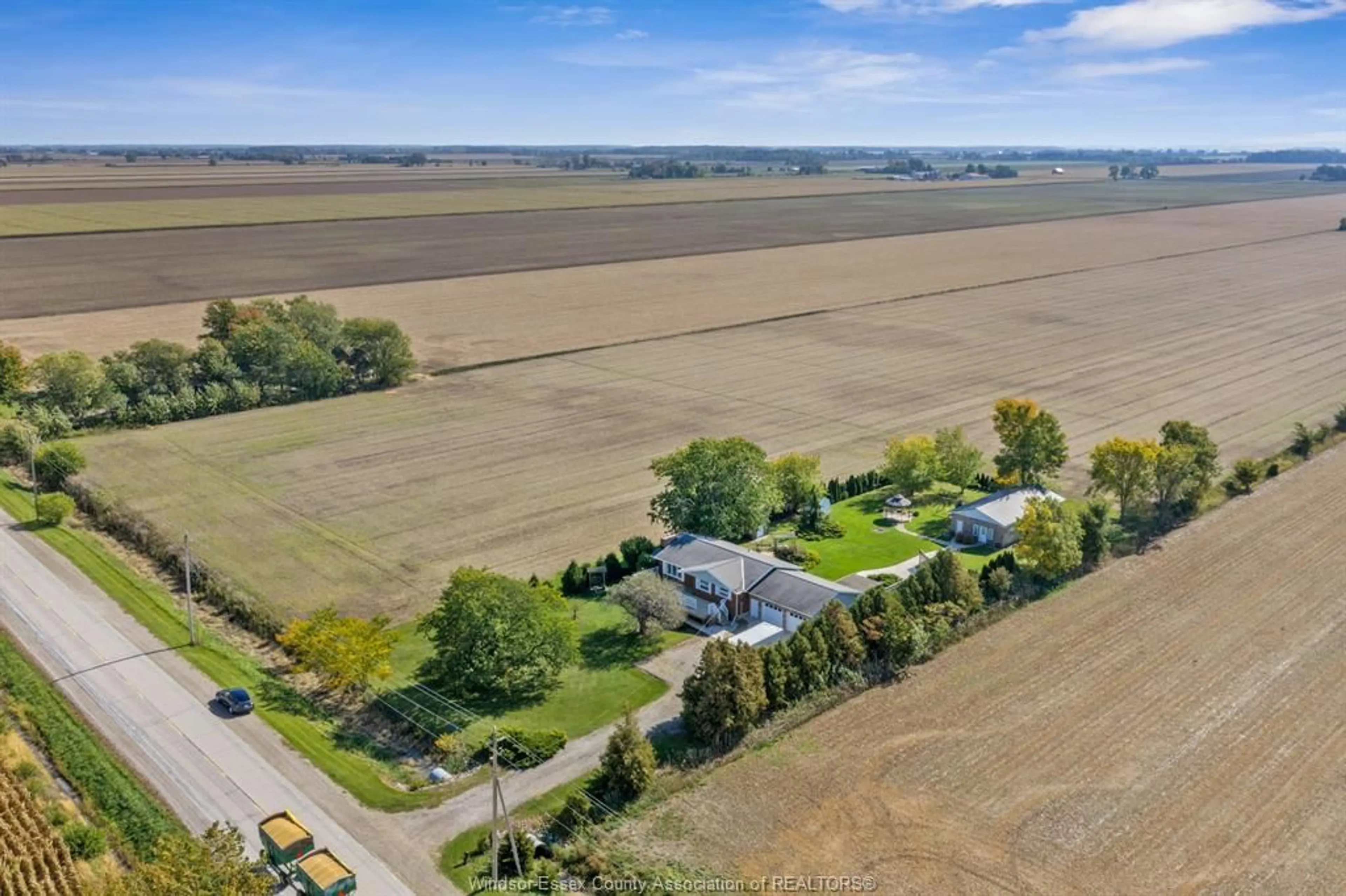 A pic from outside/outdoor area/front of a property/back of a property/a pic from drone, street for 920 Essex Road 14, Leamington Ontario N8H 3V8
