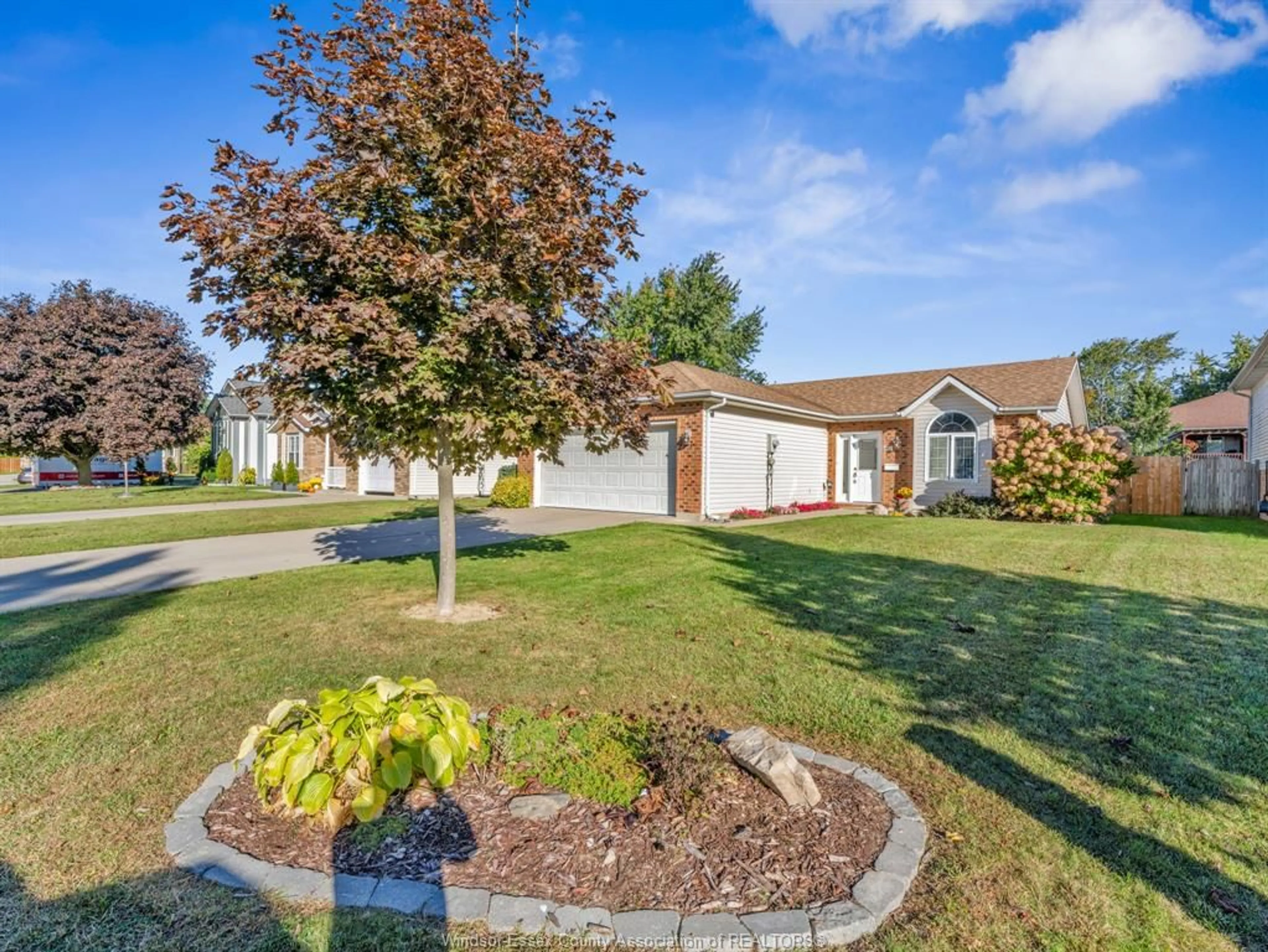 A pic from outside/outdoor area/front of a property/back of a property/a pic from drone, street for 27 EASTGROVE, Leamington Ontario N8H 5J7