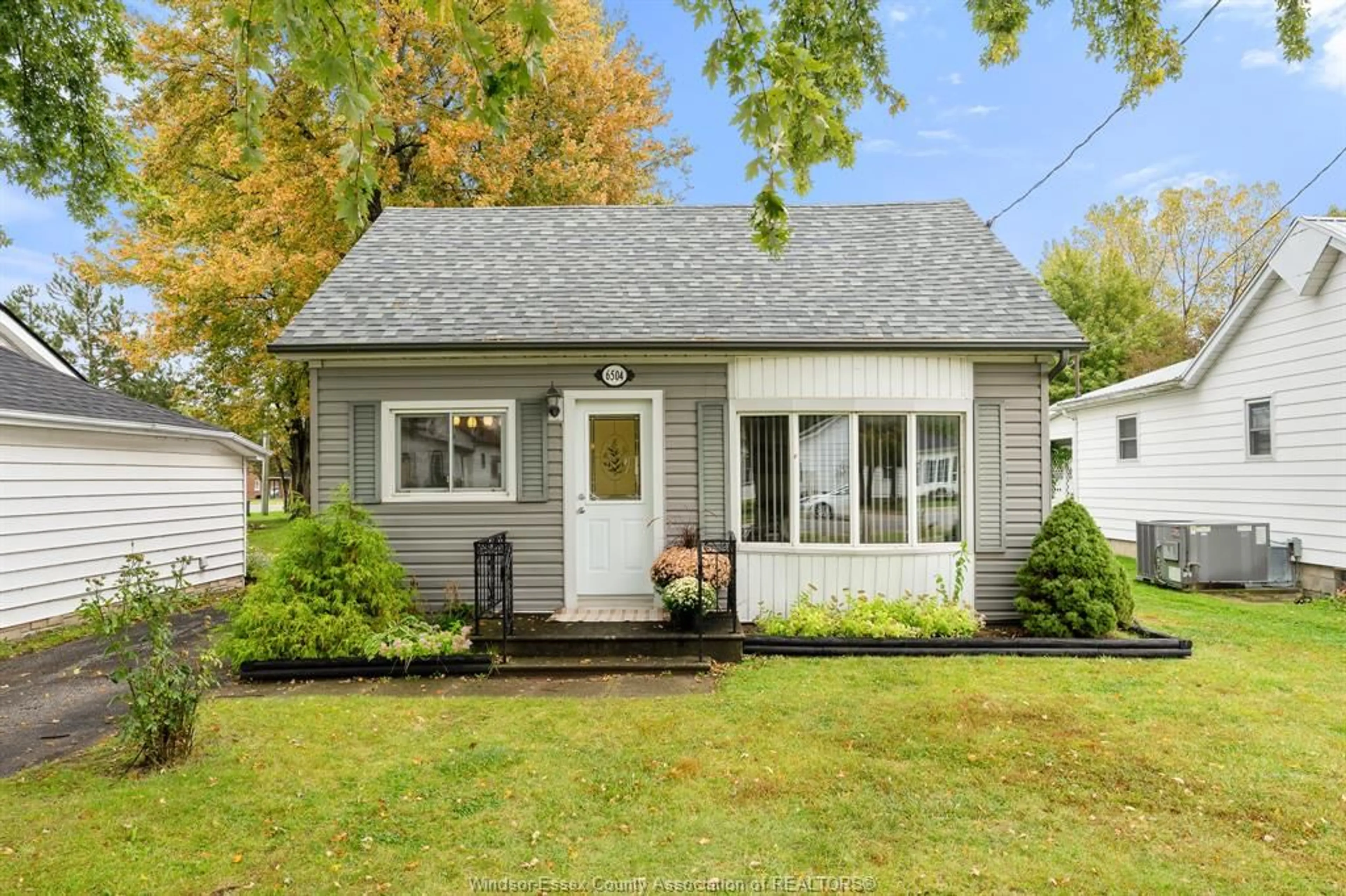 Home with vinyl exterior material, street for 6504 ABBOTT Ave, Comber Ontario N0P 1J0