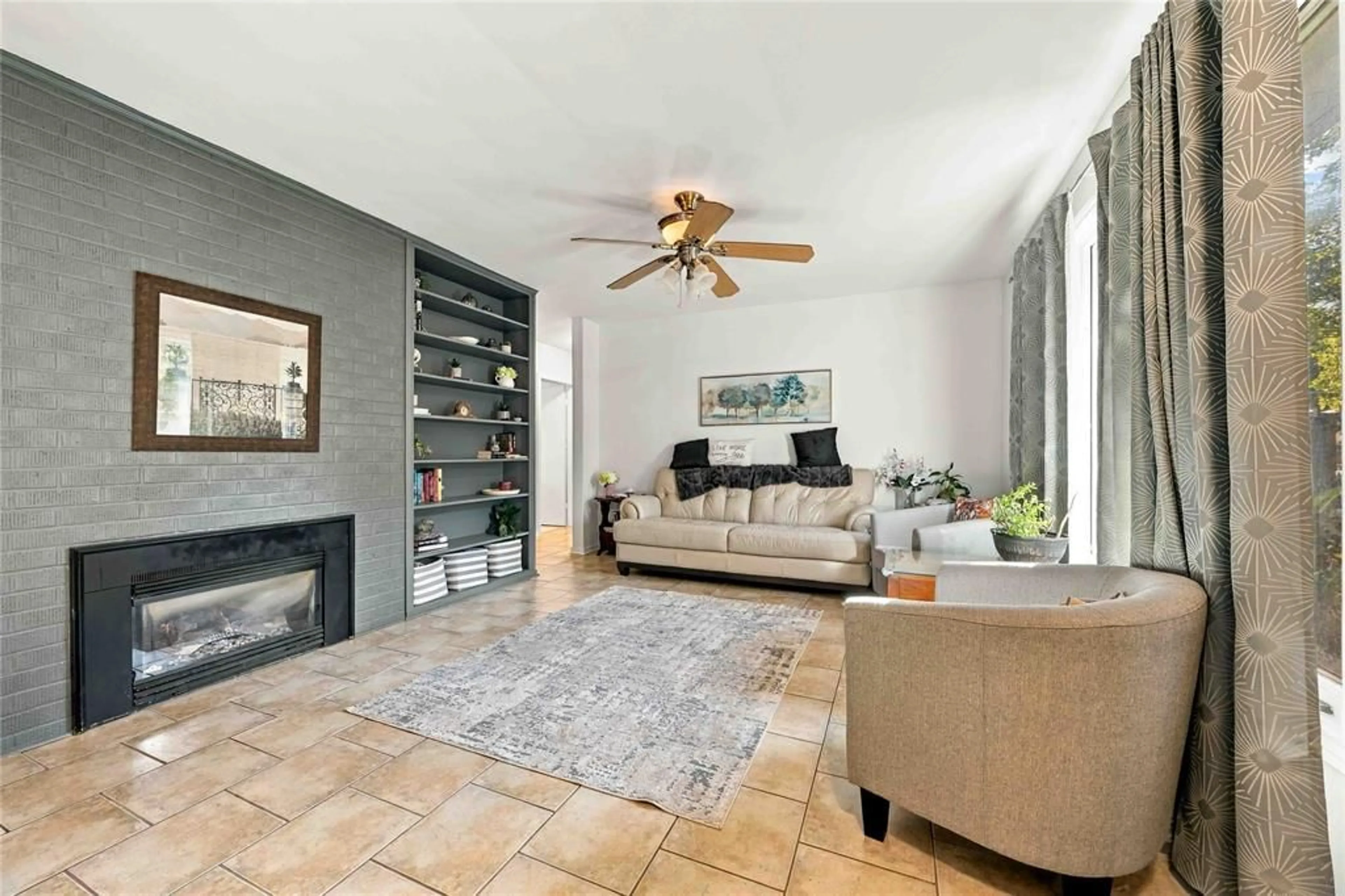 Living room with furniture, ceramic/tile floor for 914 Retlaw Dr, Sarnia Ontario N7V 2X1