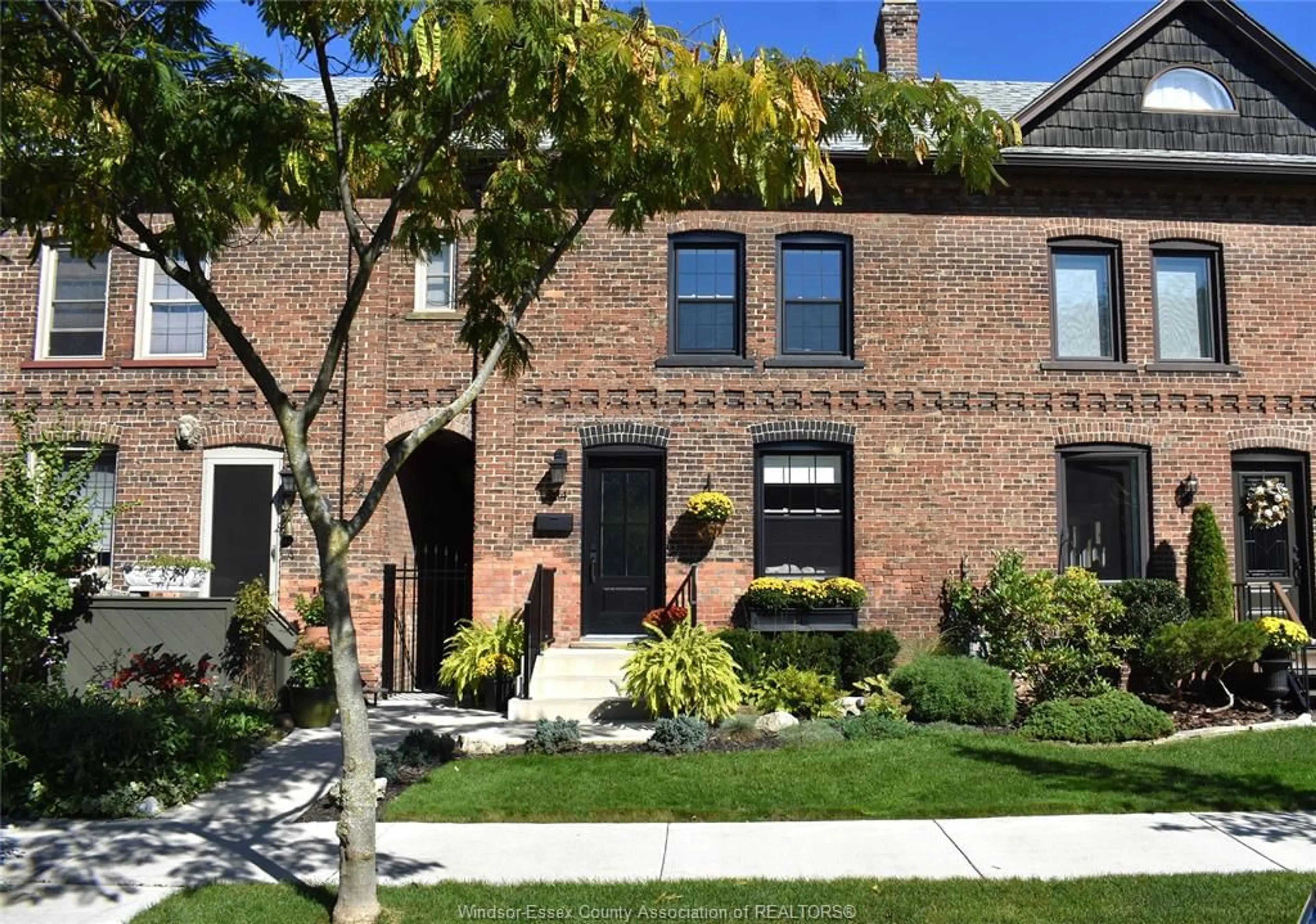 Home with brick exterior material, street for 864 Monmouth Rd, Windsor Ontario N8Y 3L4