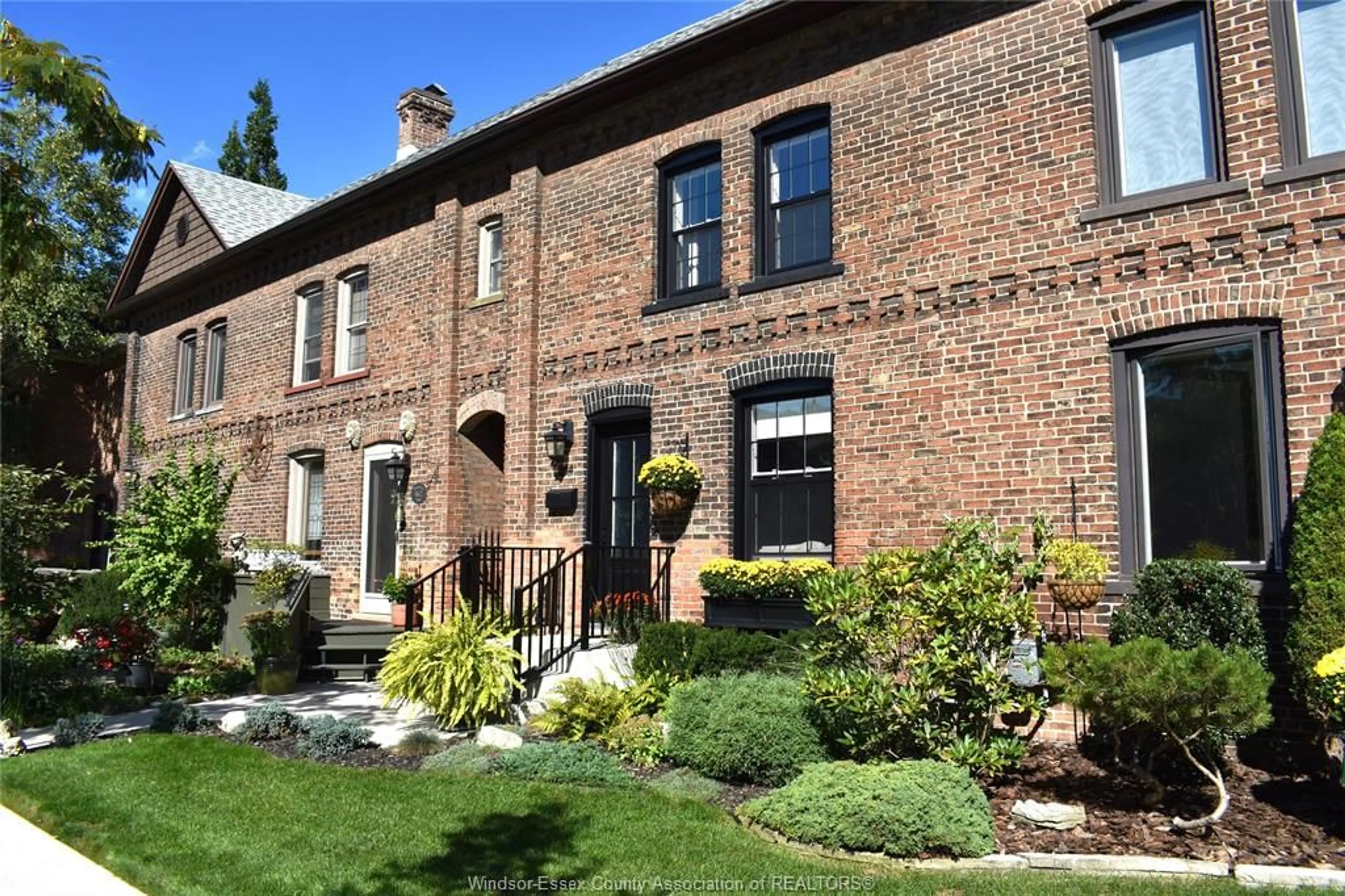Home with brick exterior material, street for 864 Monmouth Rd, Windsor Ontario N8Y 3L4
