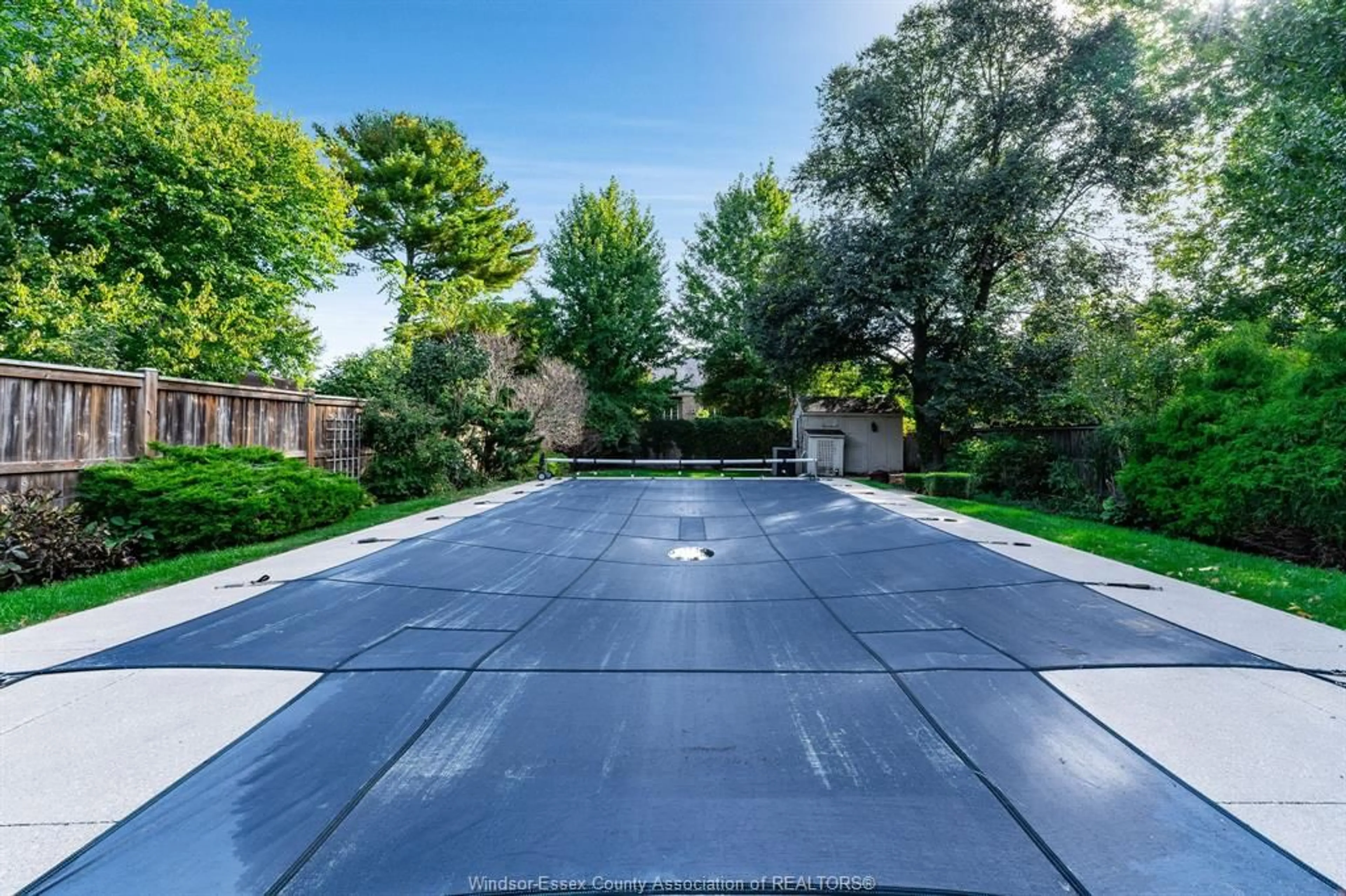 A pic from outside/outdoor area/front of a property/back of a property/a pic from drone, street for 1324 Orchard Blvd, Kingsville Ontario N9Y 2R7