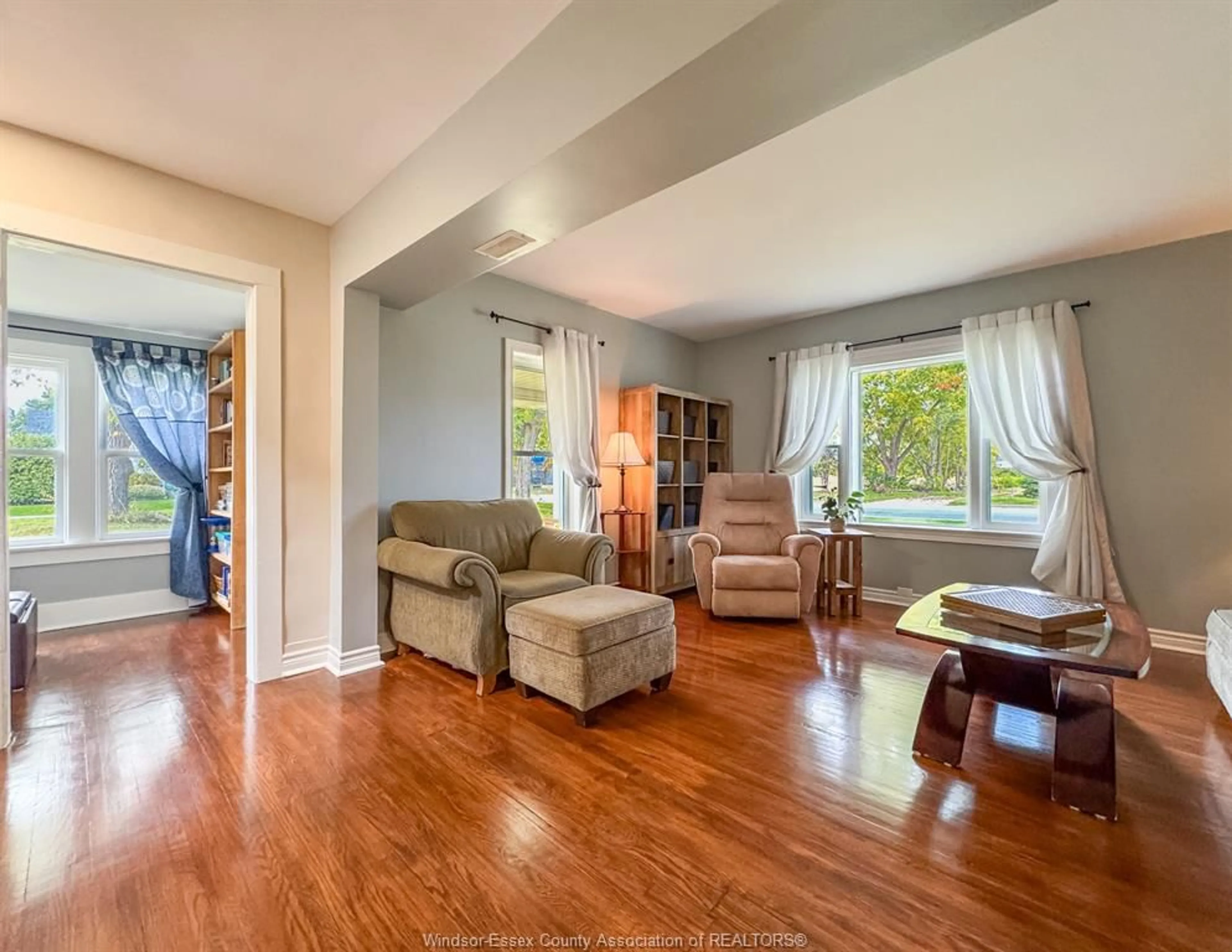 Living room with furniture, wood/laminate floor for 469 KING ST E, Harrow Ontario N0R 1G0