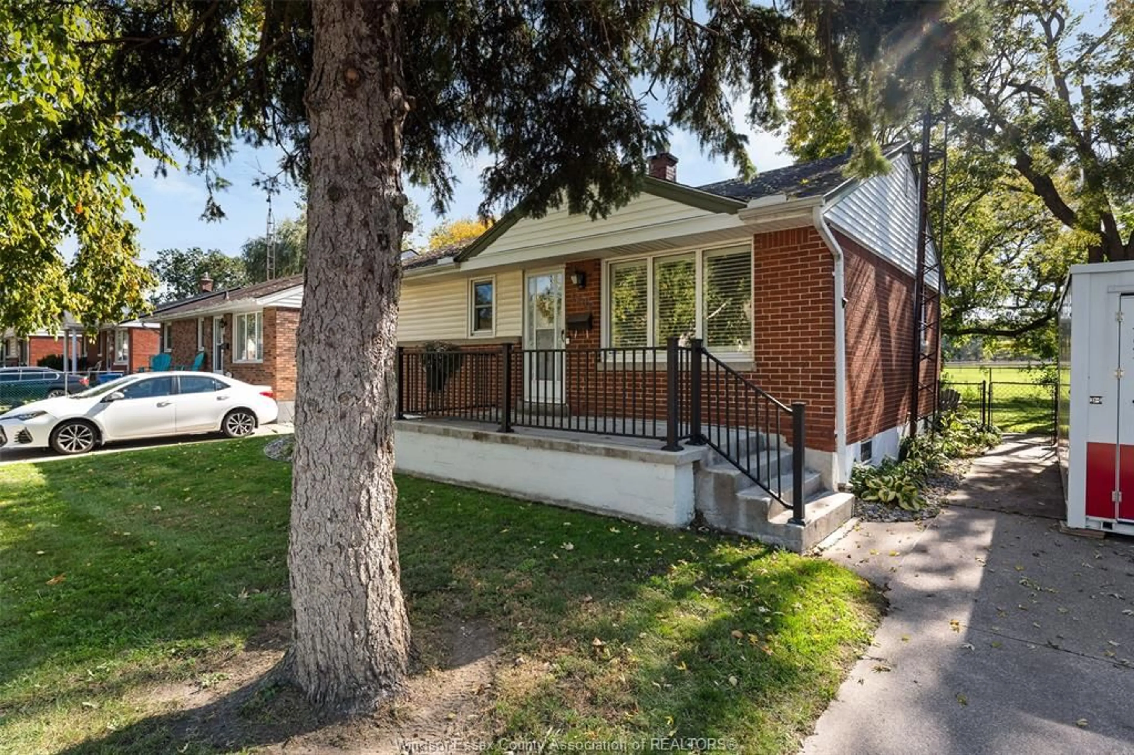 Home with brick exterior material, street for 1205 Chappell, Windsor Ontario N9C 3C8