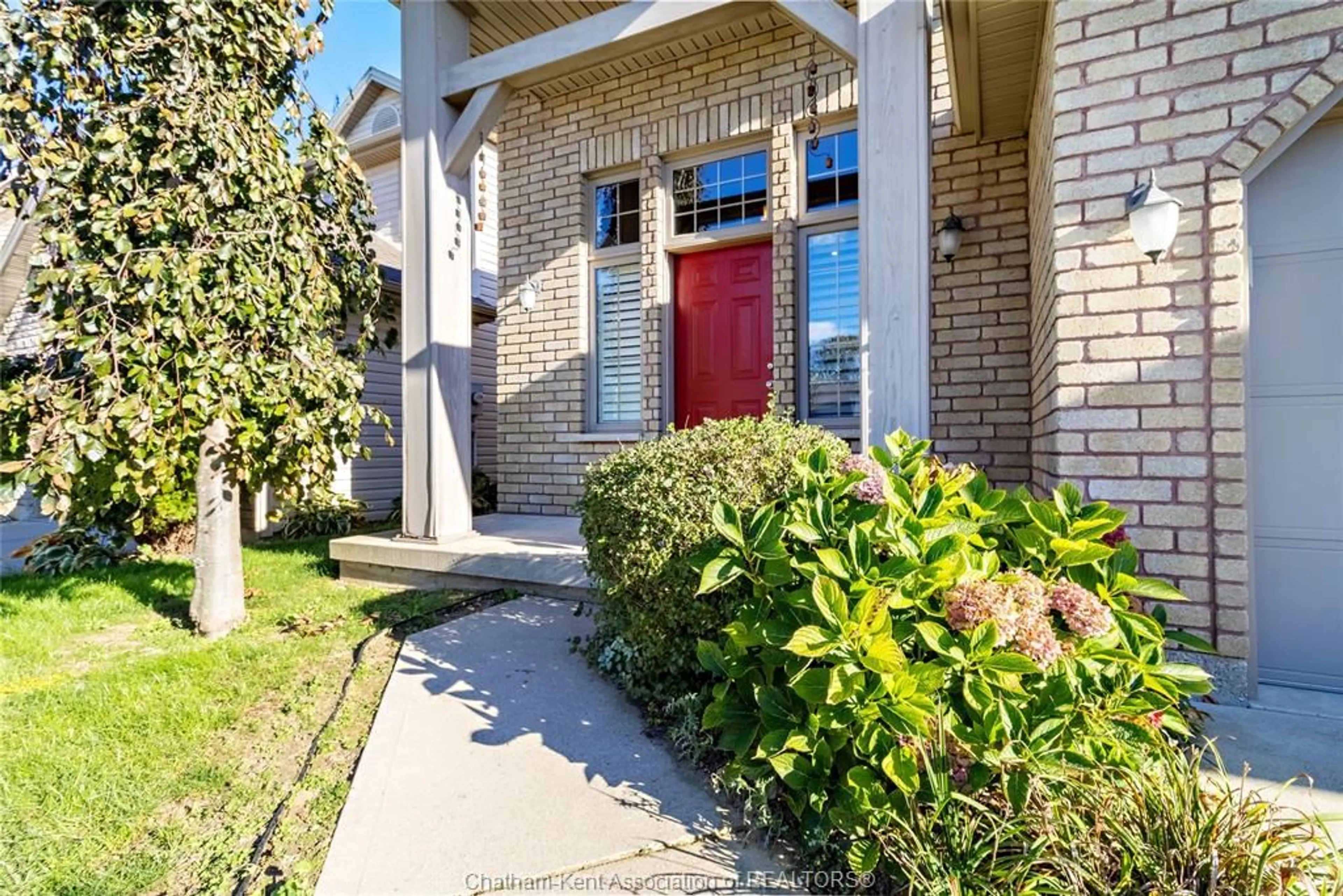 Home with brick exterior material, street for 12 Goldenrod Crt, Chatham Ontario N7L 0A2