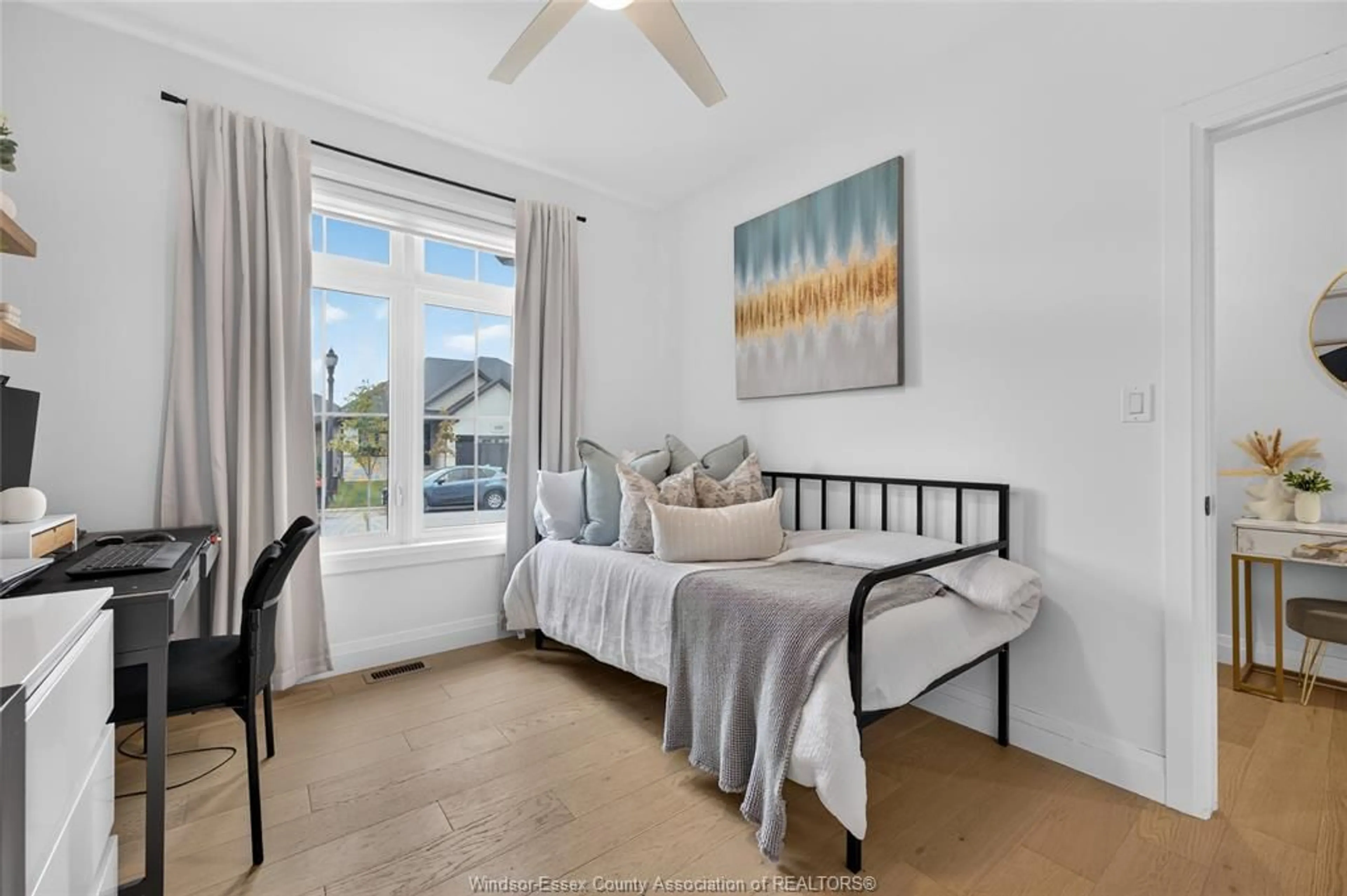 Bedroom with bed, wood/laminate floor for 2362 Barkley Ave, Windsor Ontario N8P 0G7
