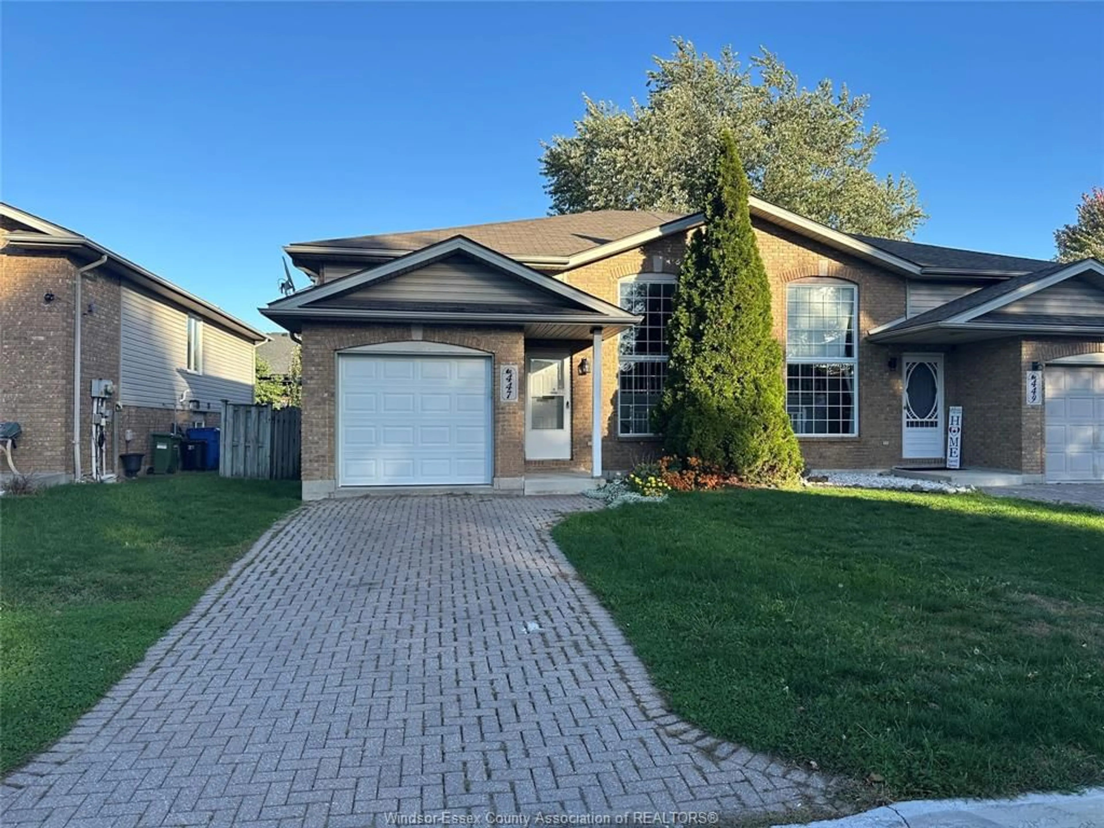 Home with brick exterior material, street for 447 MERRILL Ave, LaSalle Ontario N9J 3R2