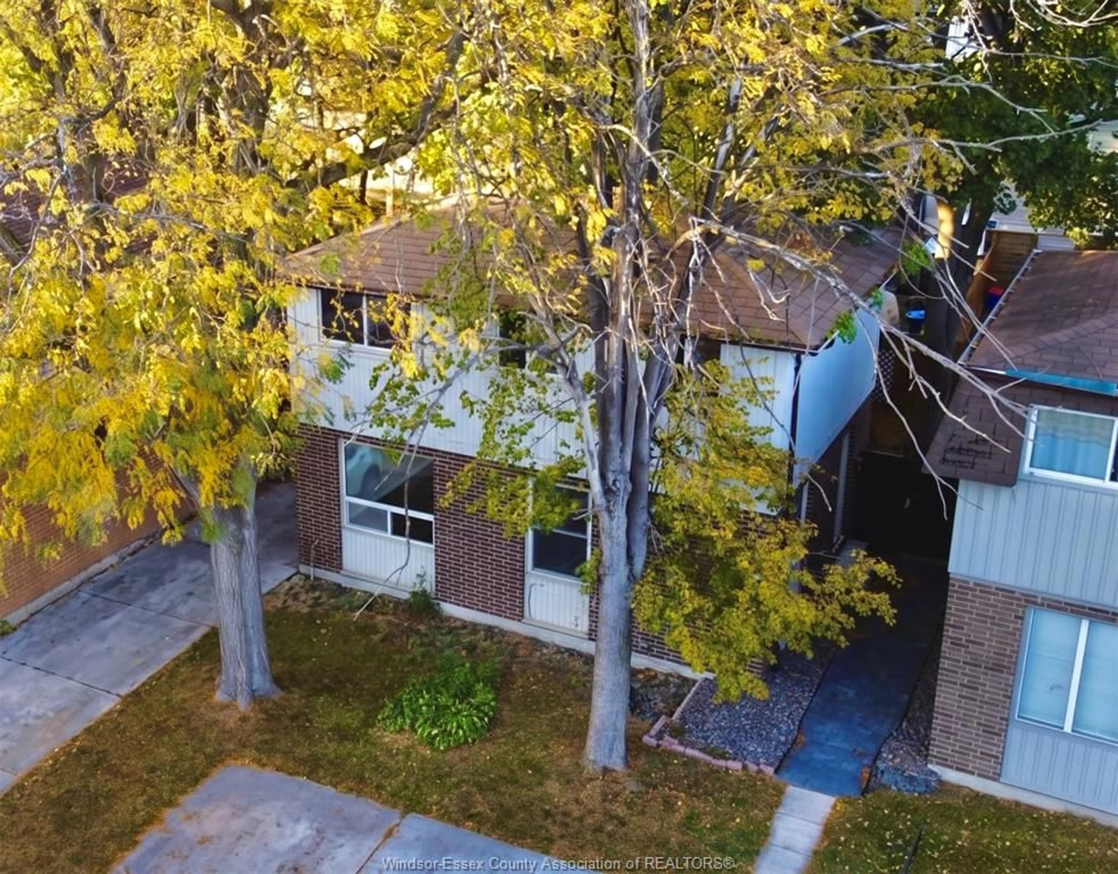 A pic from outside/outdoor area/front of a property/back of a property/a pic from drone, street for 9370 AIRE Crt, Windsor Ontario N8S 4E6