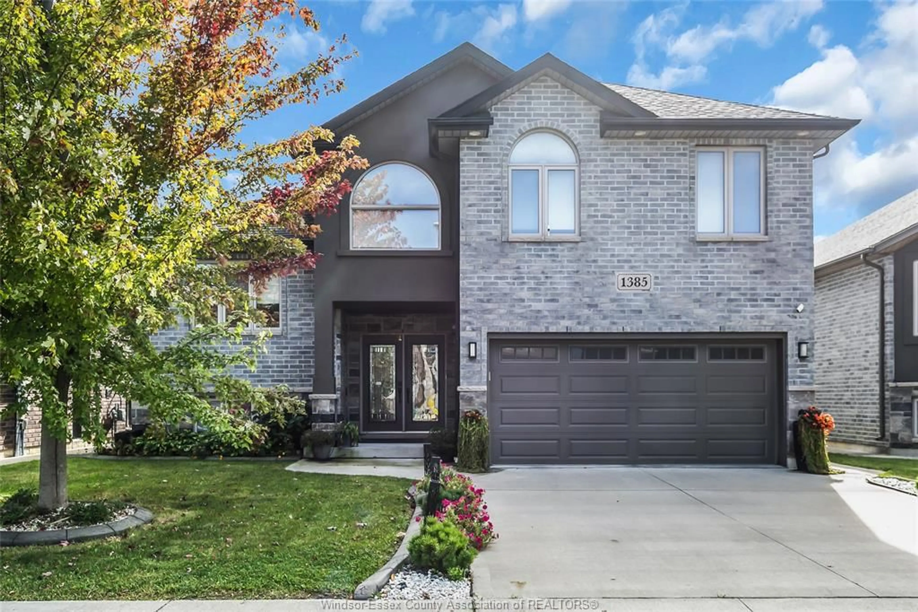 Home with brick exterior material, street for 1385 CANCUN St, Windsor Ontario N9G 0A2