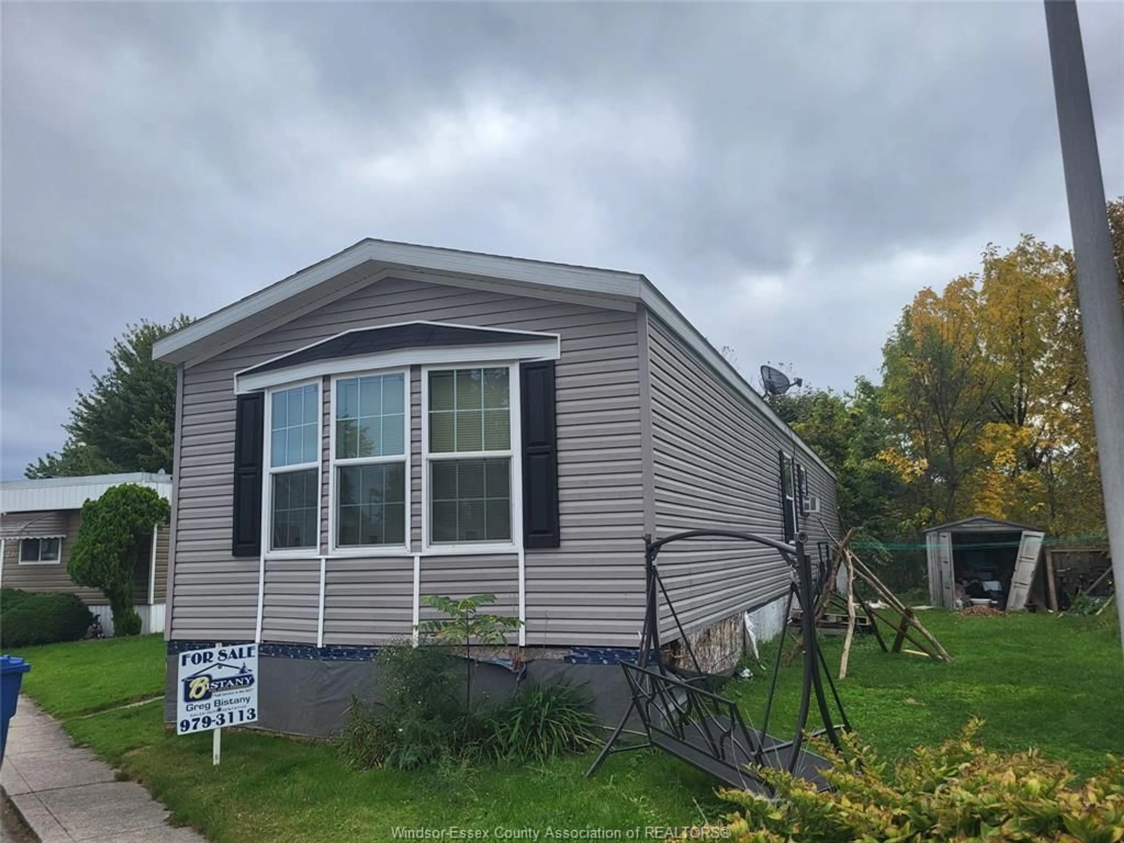 Home with vinyl exterior material, street for 21 WILDER, Lakeshore Ontario N8N 2S9