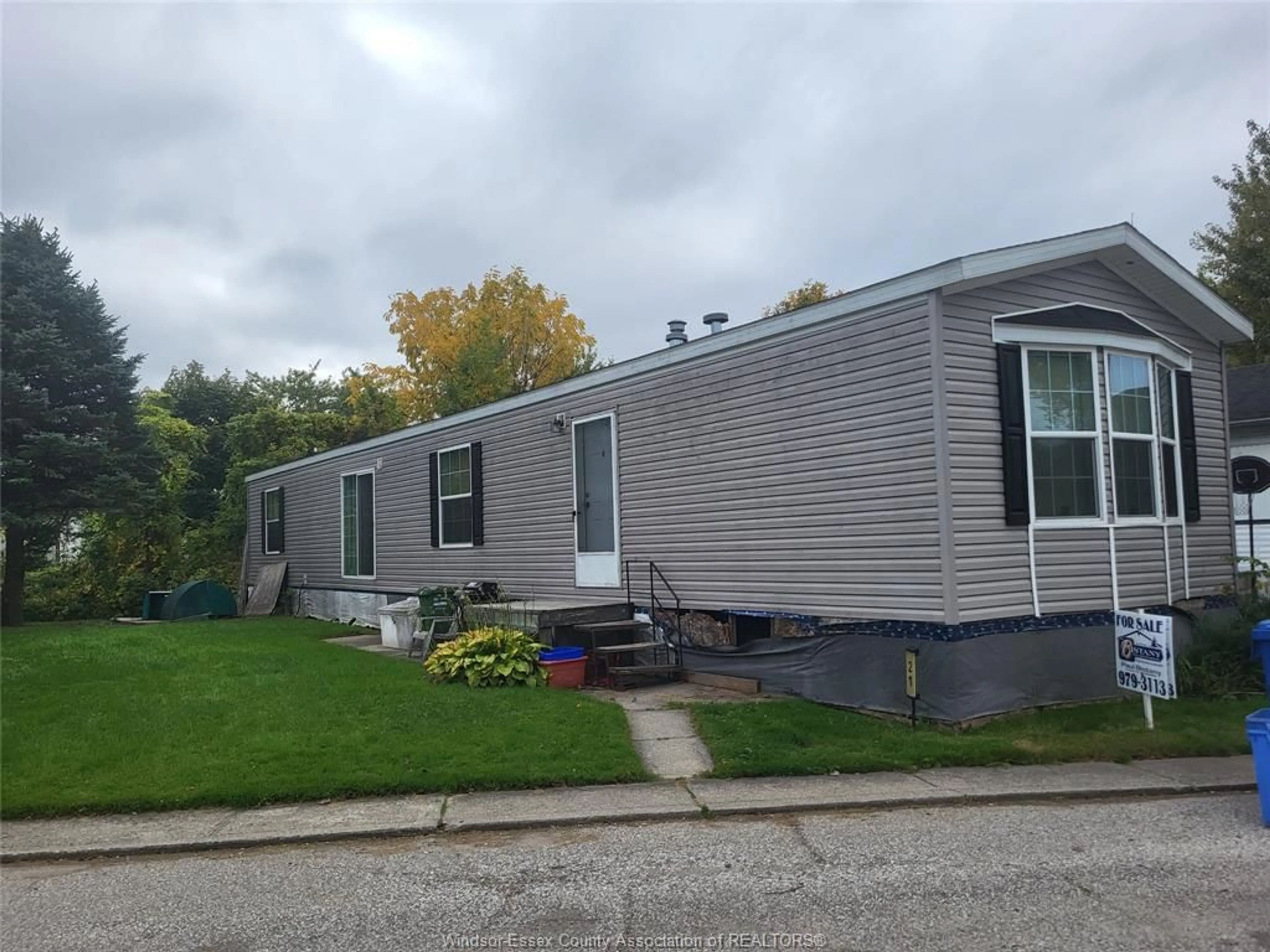 Home with vinyl exterior material, street for 21 WILDER, Lakeshore Ontario N8N 2S9