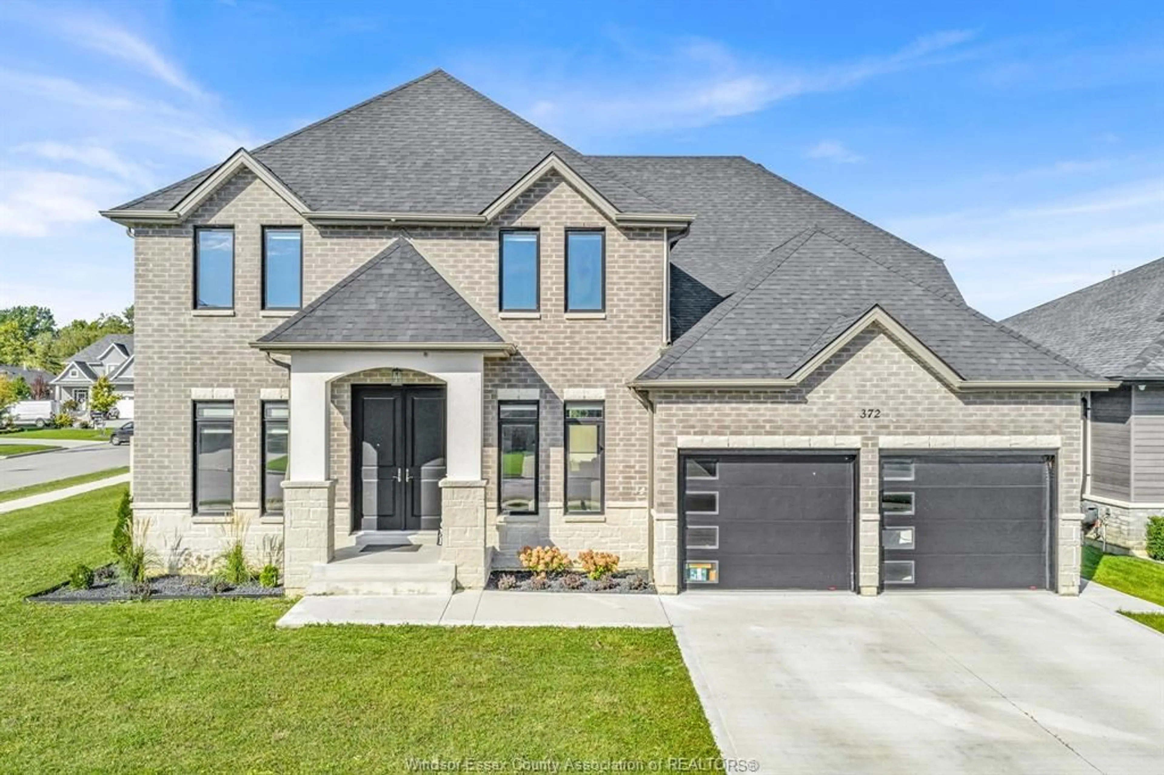 Home with brick exterior material, street for 372 WATER Ave, Lakeshore Ontario N0R 1A0