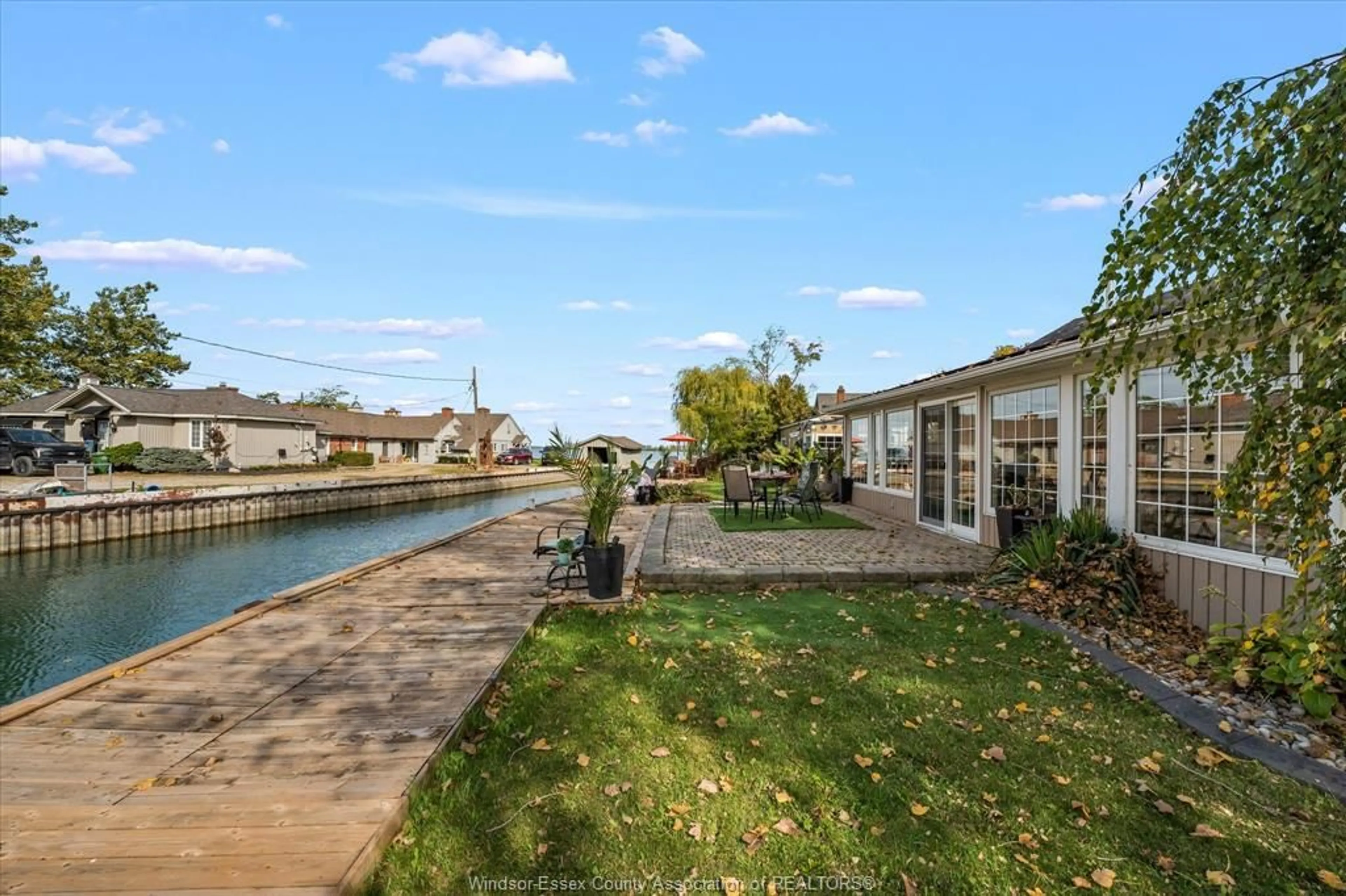 A pic from outside/outdoor area/front of a property/back of a property/a pic from drone, water/lake/river/ocean view for 3 SHANGRILA St, Amherstburg Ontario N9V 2T3