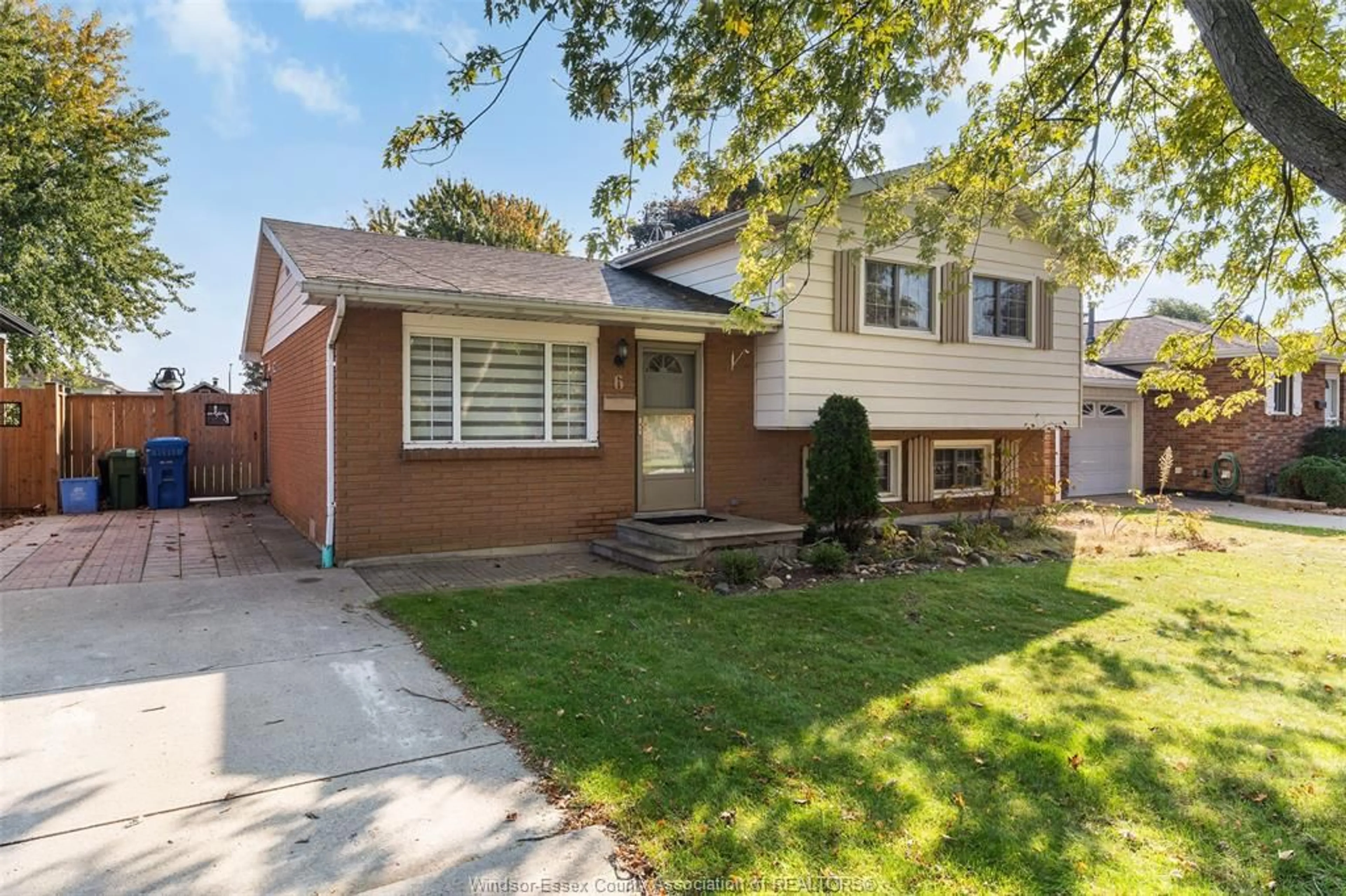 Home with brick exterior material, street for 6 CAMELOT Ave, Leamington Ontario N8H 4V6