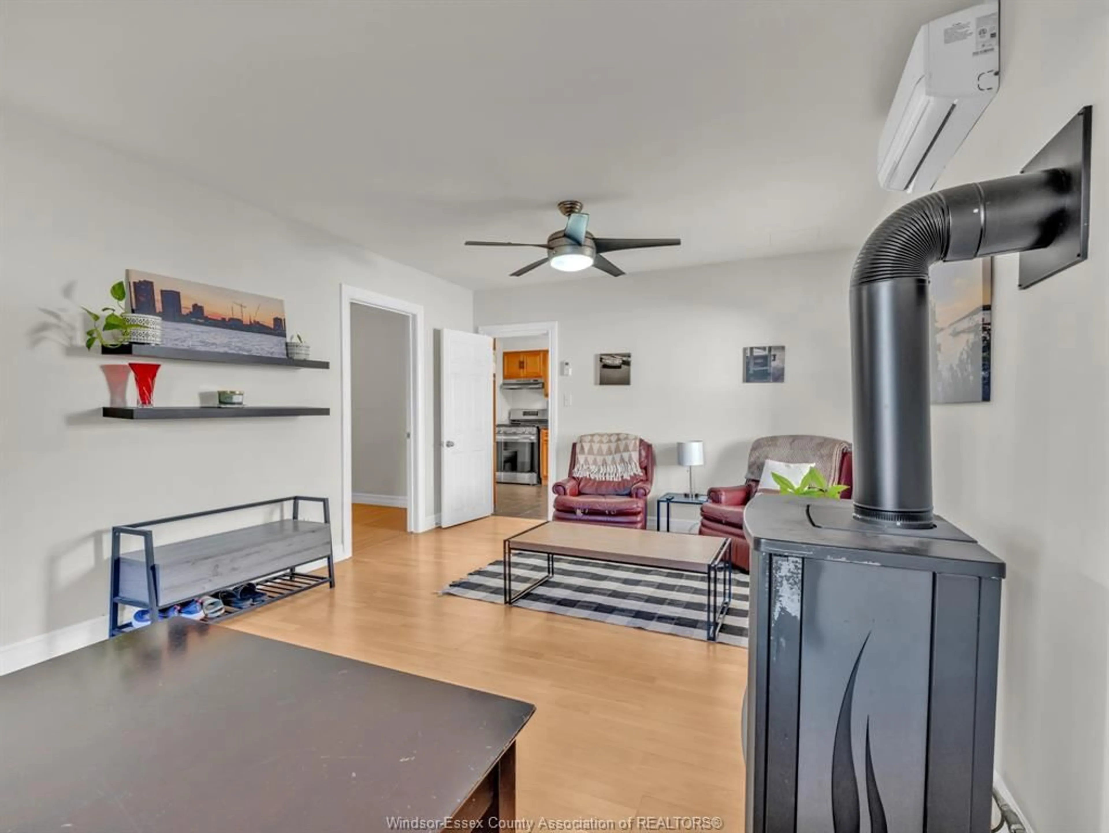 Living room with furniture, wood/laminate floor for 719 HILDEGARDE, Windsor Ontario N8X 2Z9