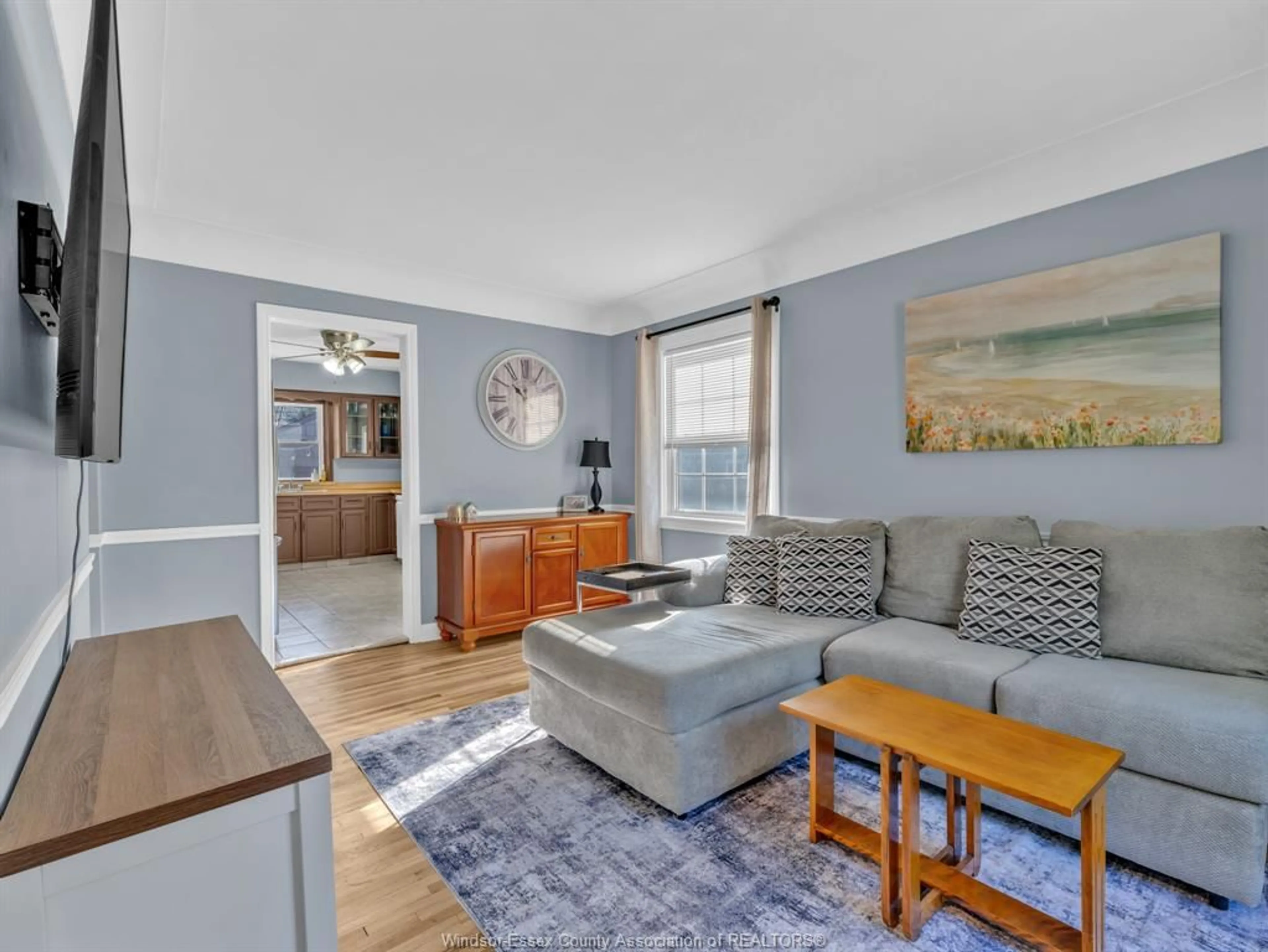 Living room with furniture, wood/laminate floor for 1030 FAIRVIEW Blvd, Windsor Ontario N8S 3E7