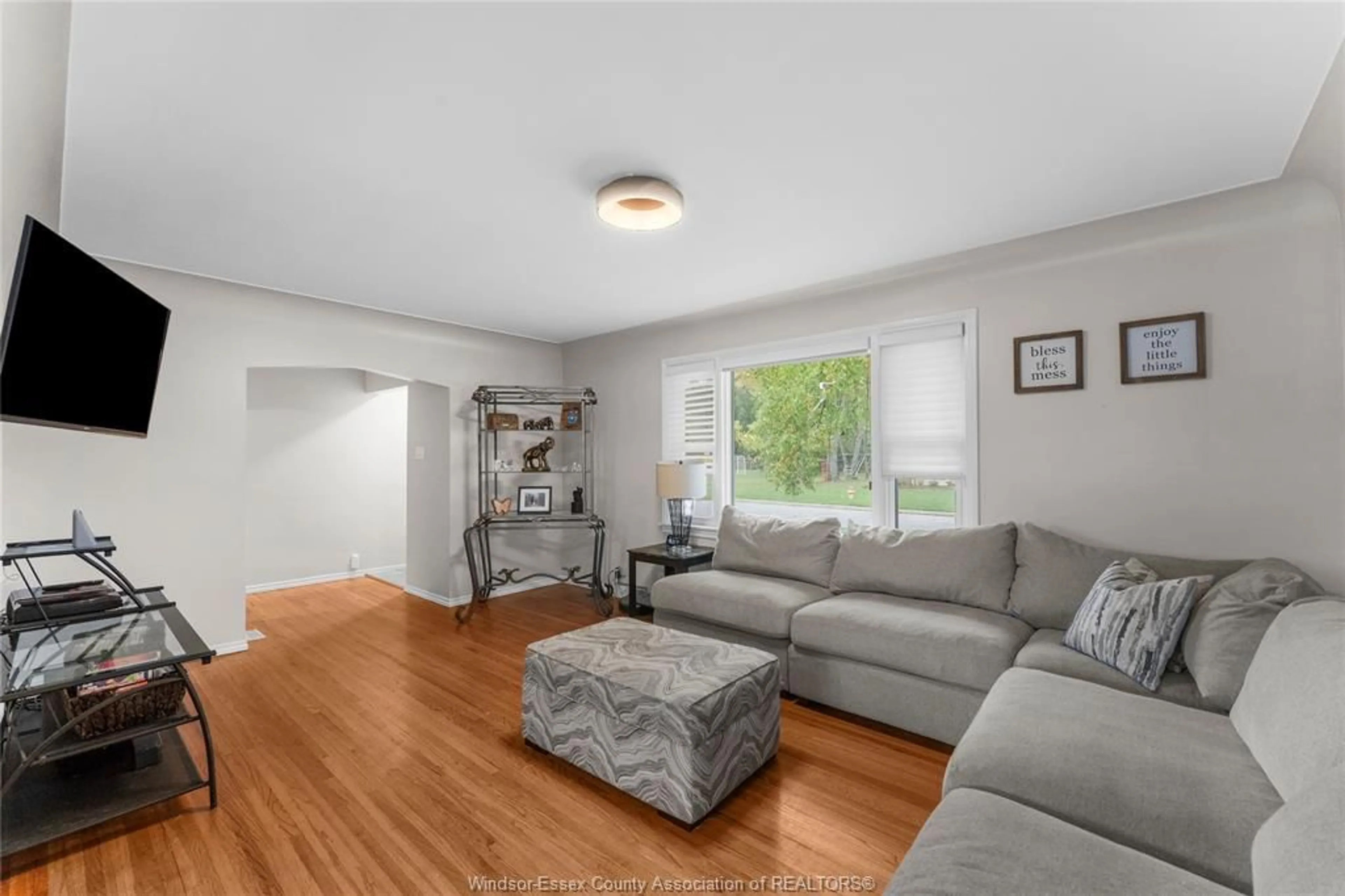 Living room with furniture, wood/laminate floor for 2505 Virginia Park Ave, Windsor Ontario N9E 2B5