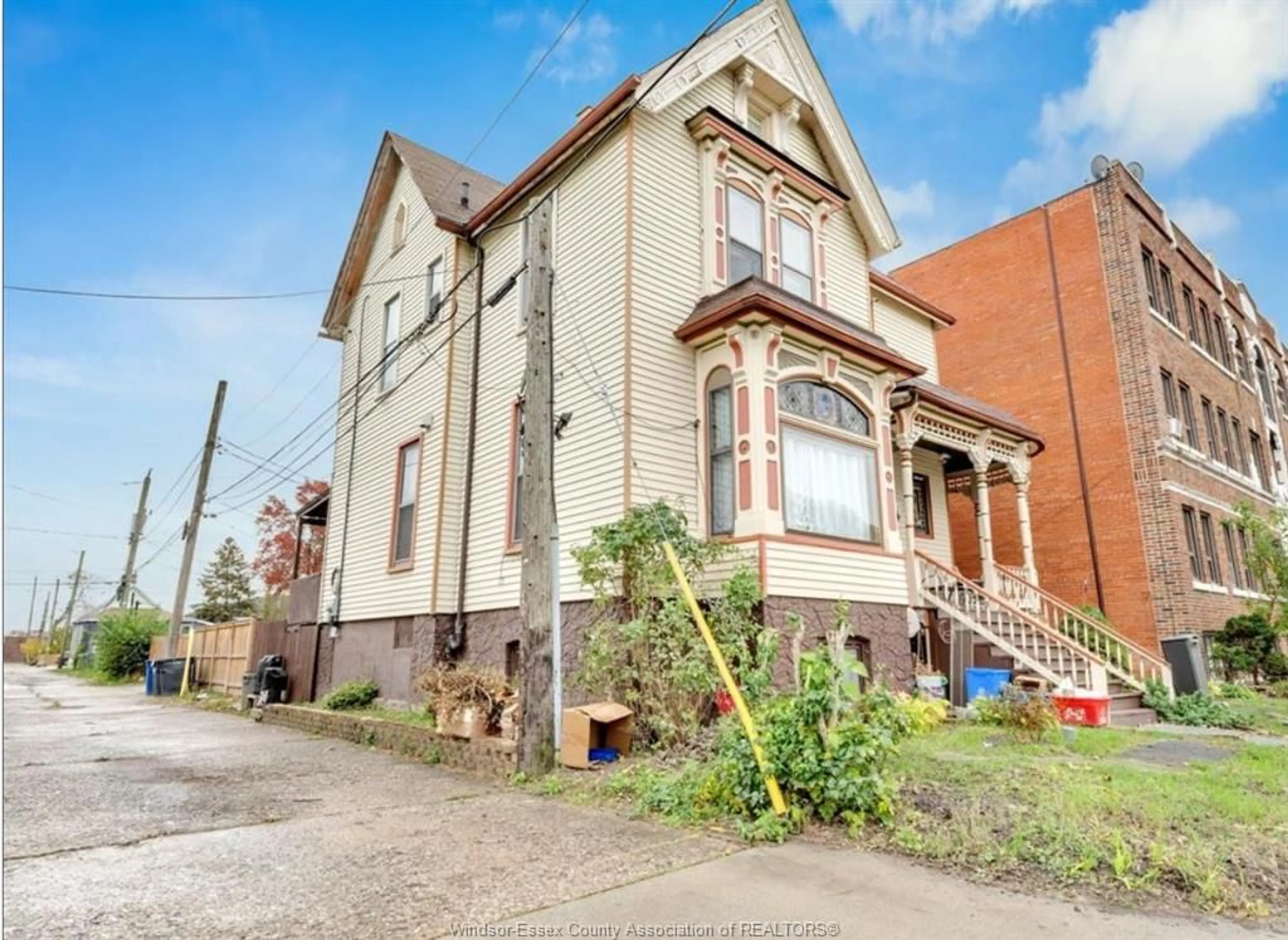 Home with brick exterior material, street for 595 CATARAQUI, Windsor Ontario N9A 3P2