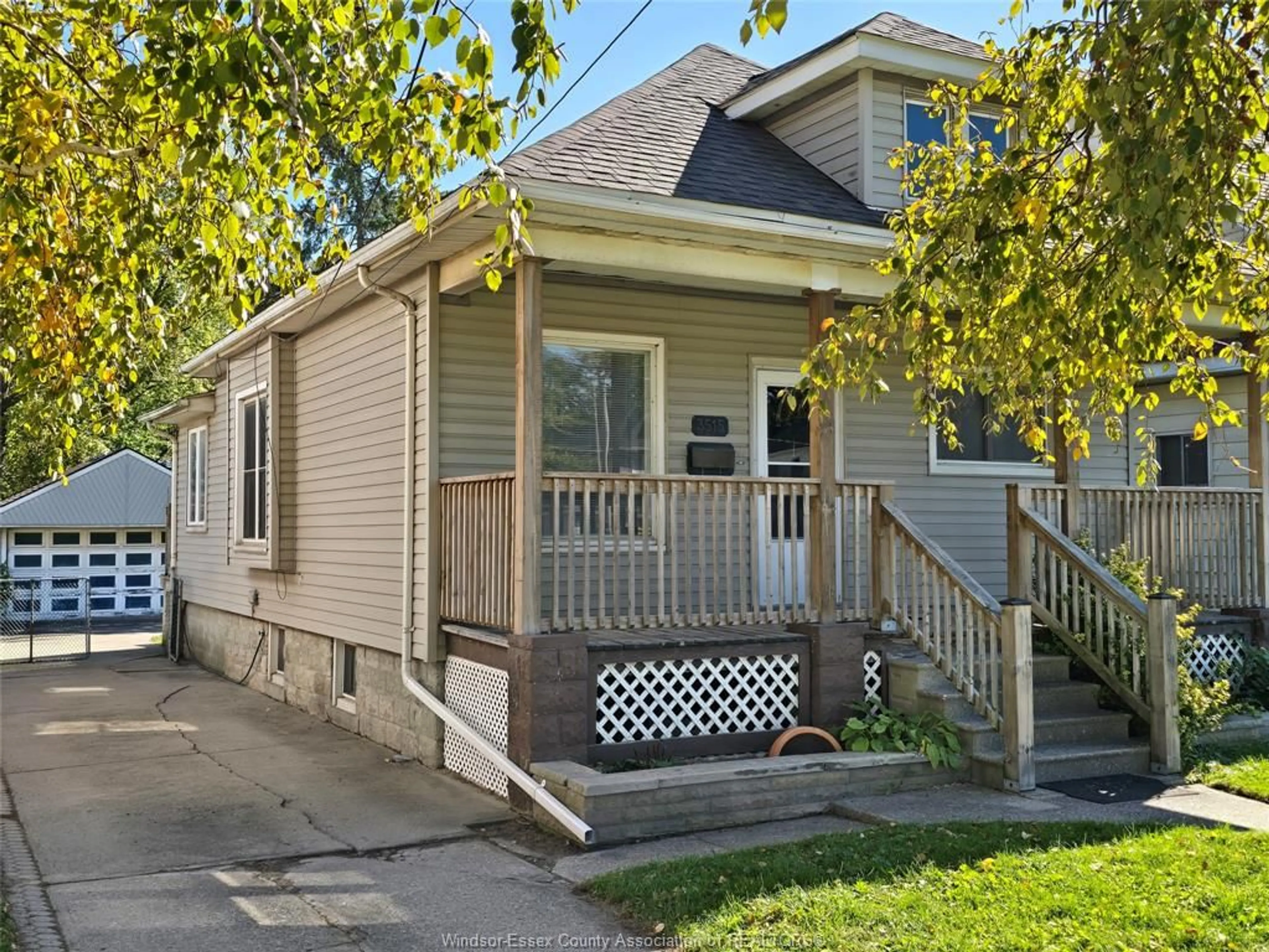 Home with vinyl exterior material, street for 3515 SANDWICH St, Windsor Ontario N9C 1B6