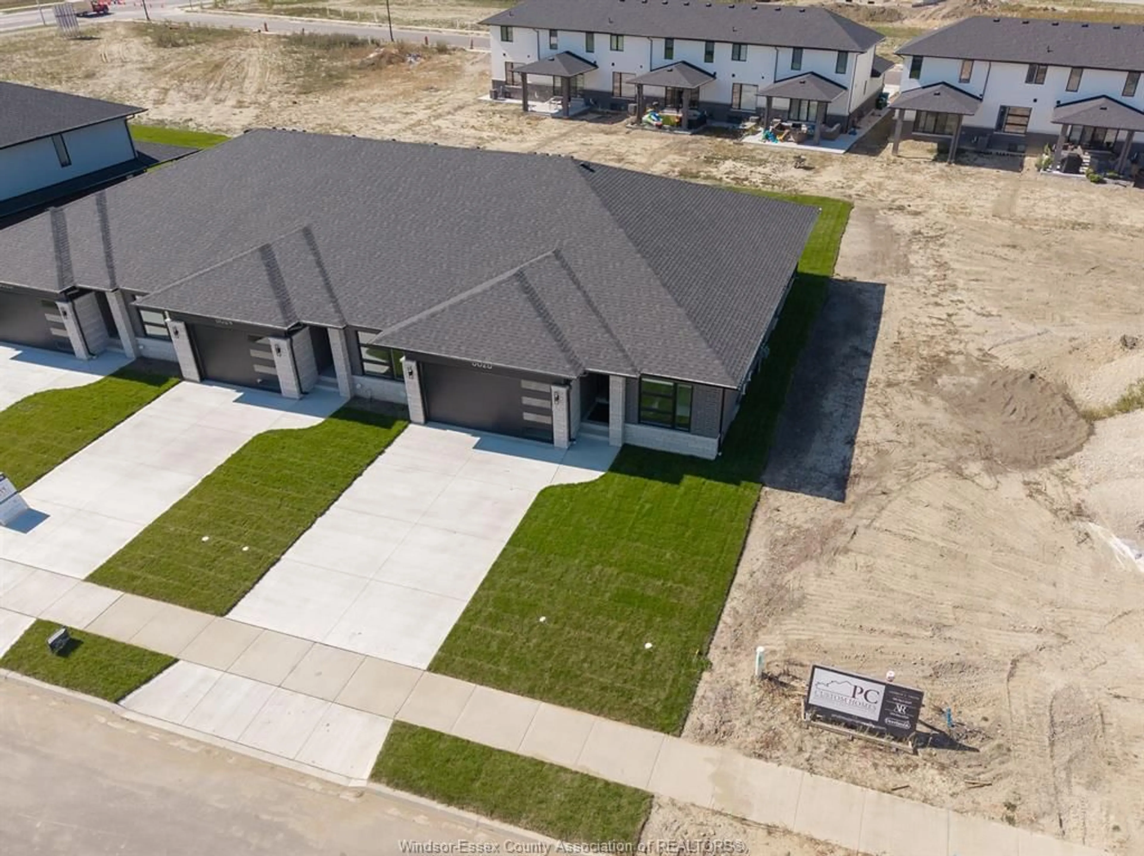 A pic from outside/outdoor area/front of a property/back of a property/a pic from drone, street for 8028 Meo Blvd, LaSalle Ontario N9H 0P3